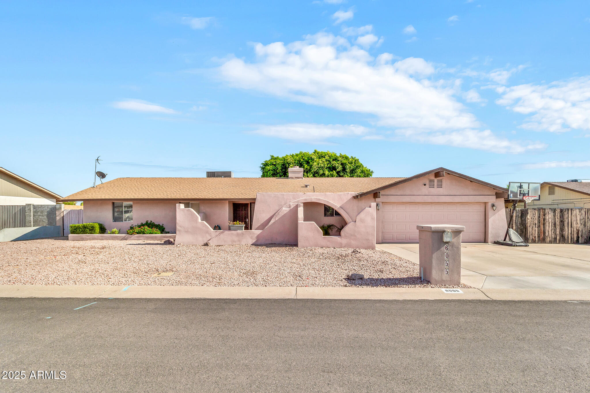 6055 E HANNIBAL Street