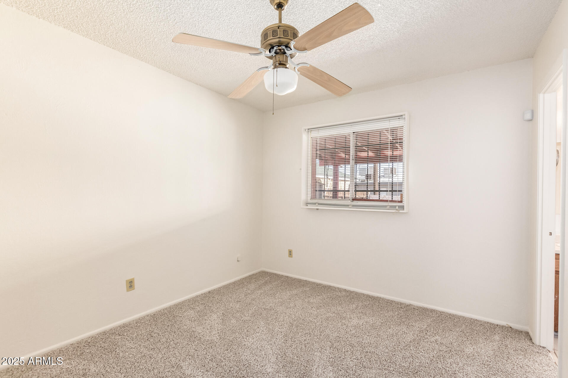 6521 W FLOWER Street