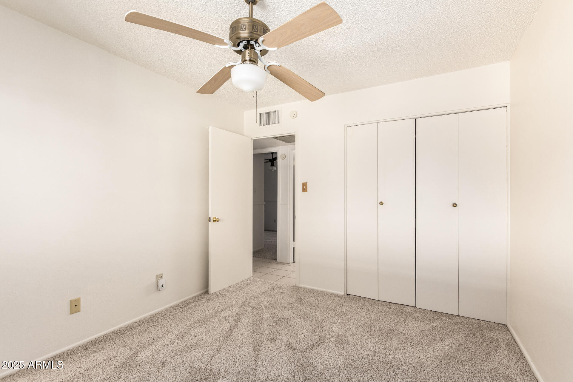 6521 W FLOWER Street