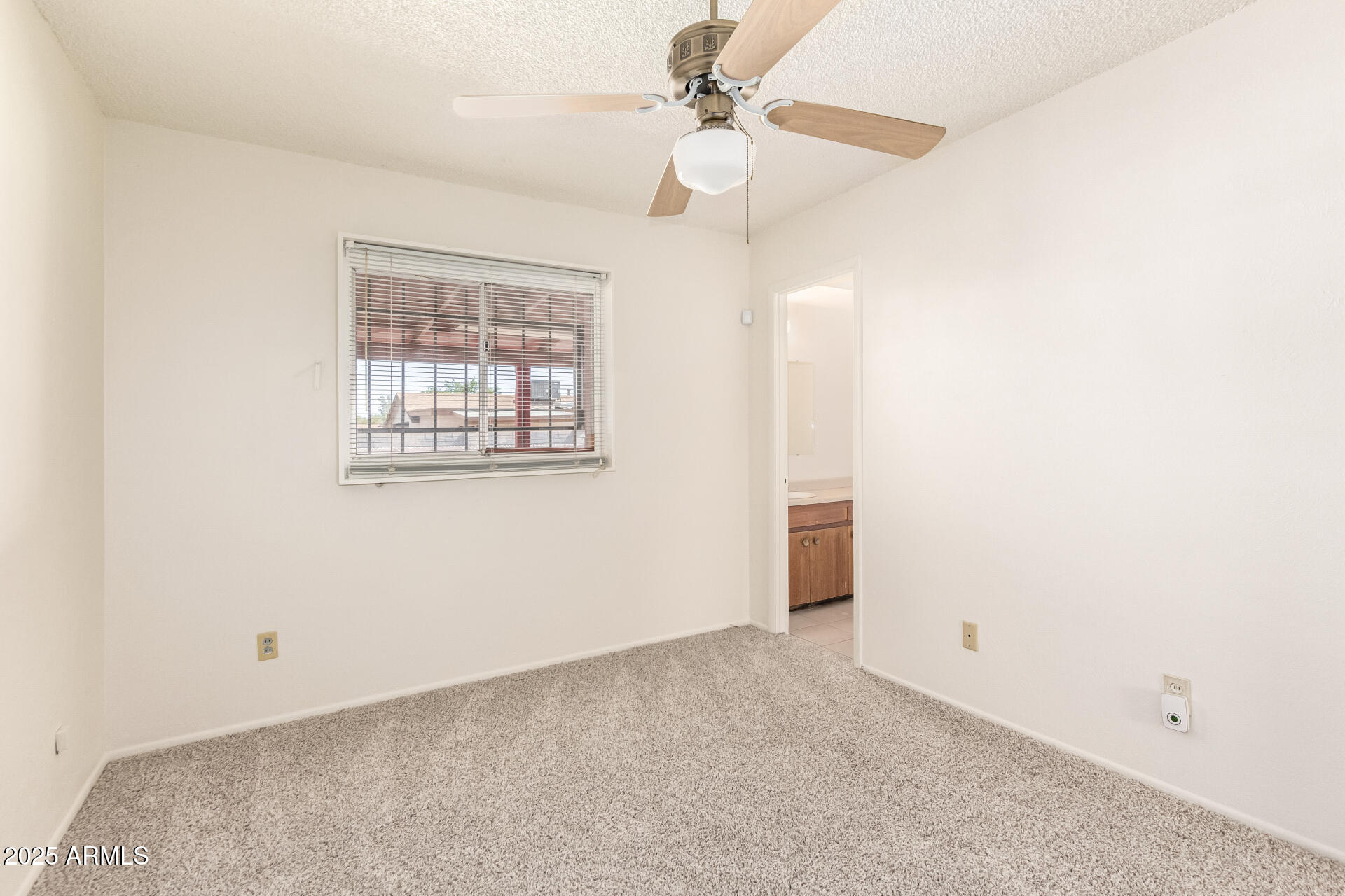 6521 W FLOWER Street