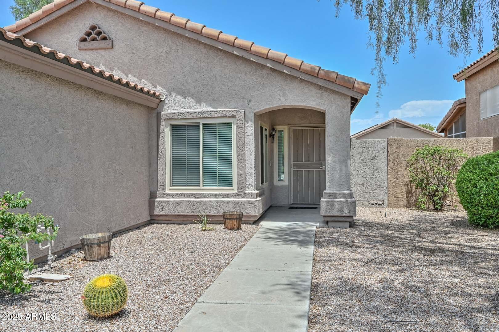 6972 W Aire Libre Avenue