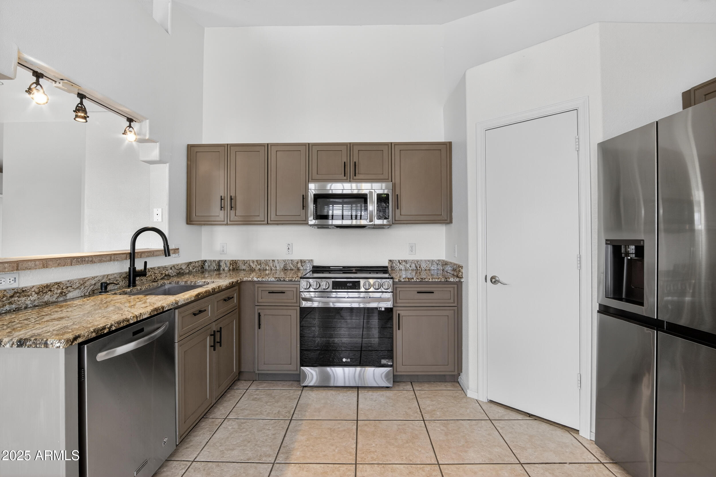 9425 E ENSENADA Street