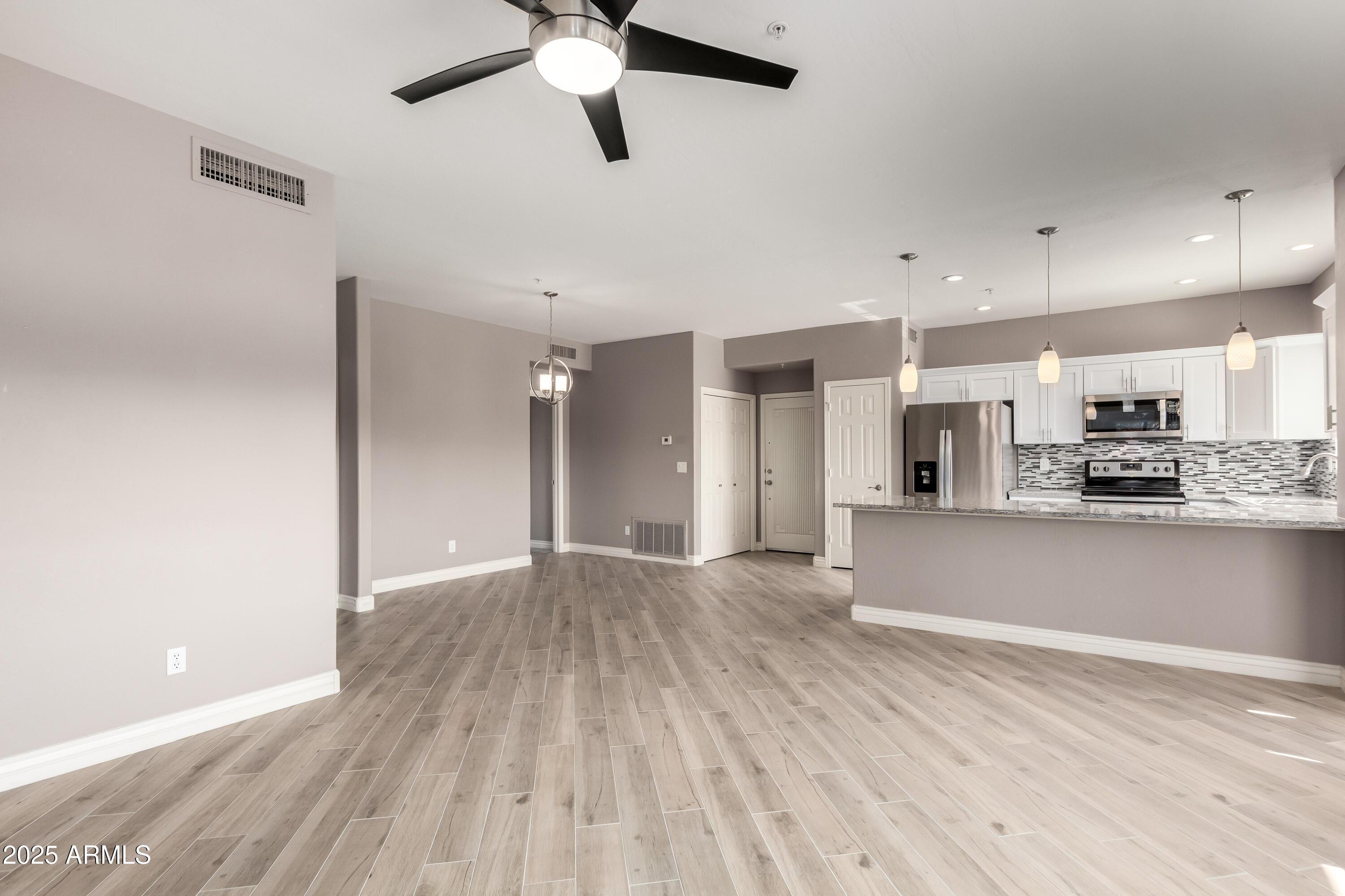 9100 E RAINTREE Drive 239