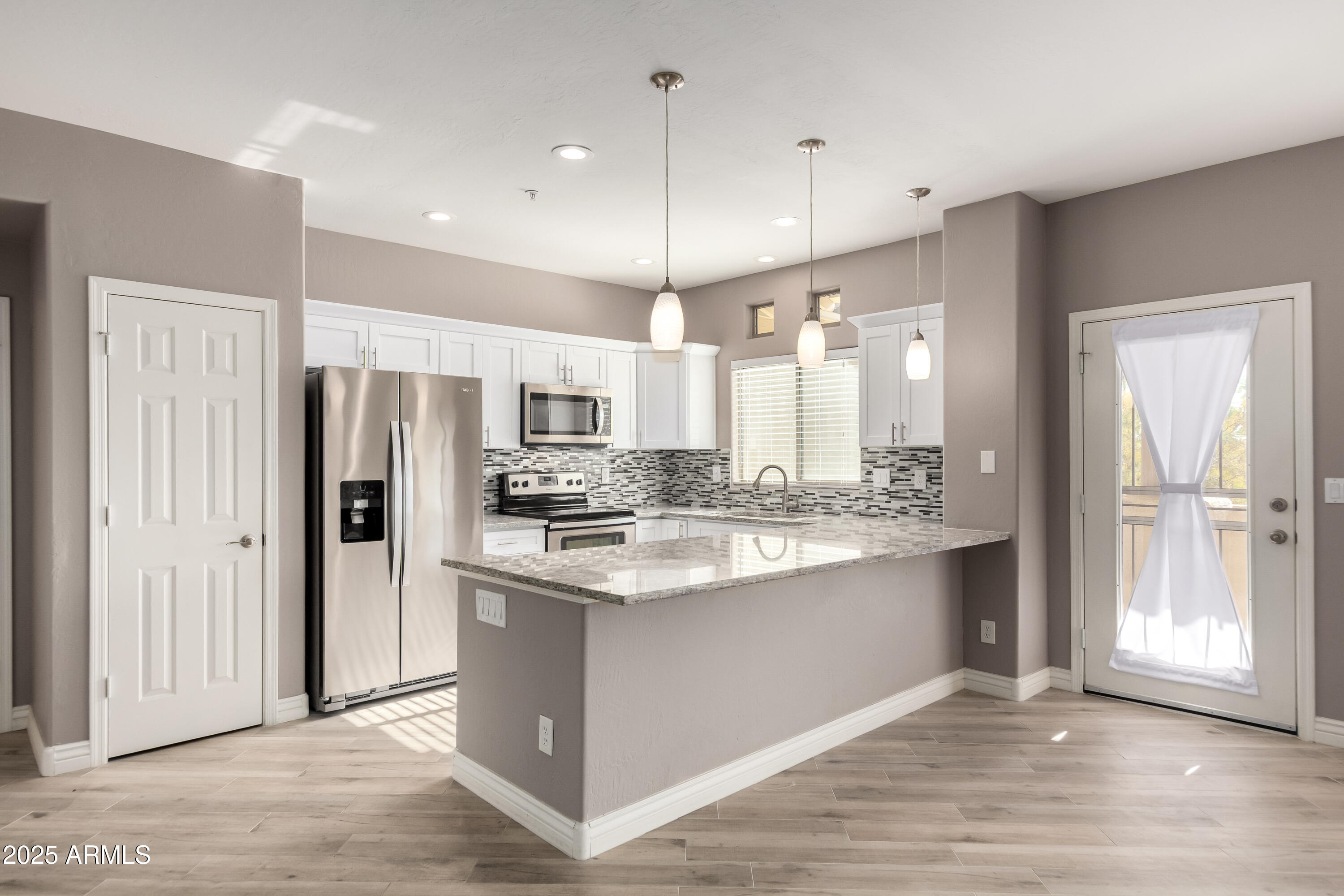 9100 E RAINTREE Drive 239