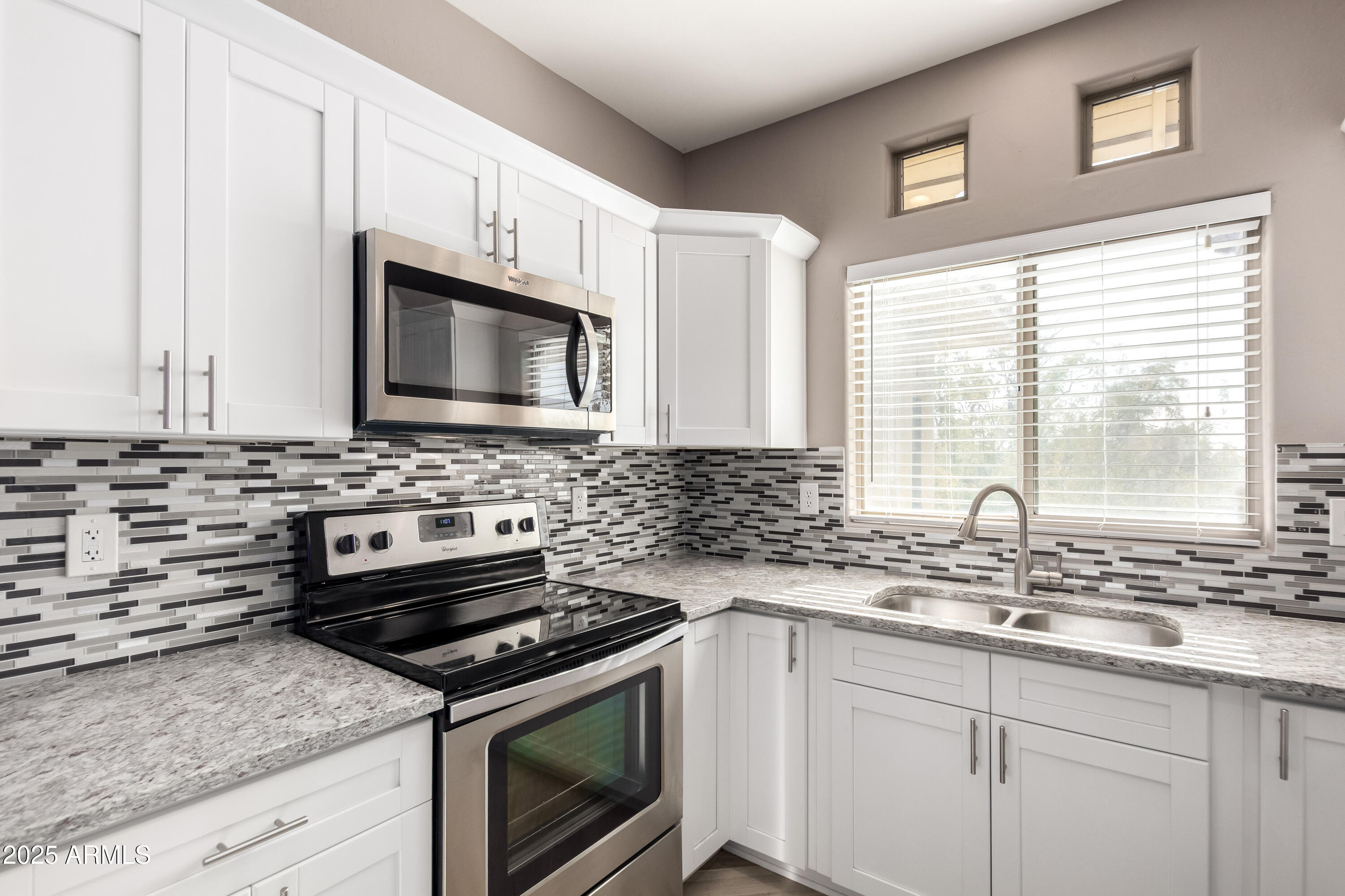 9100 E RAINTREE Drive 239