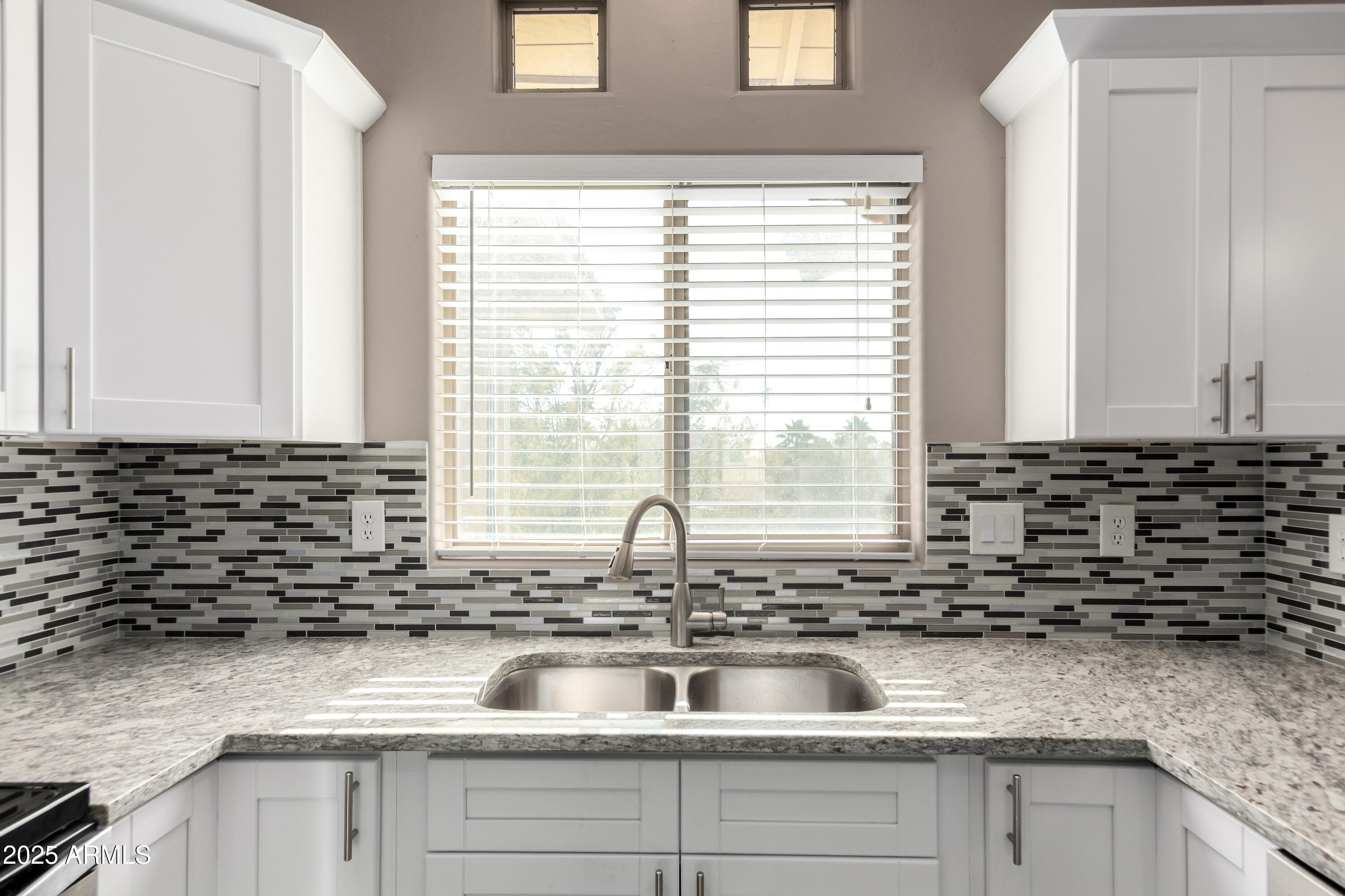 9100 E RAINTREE Drive 239