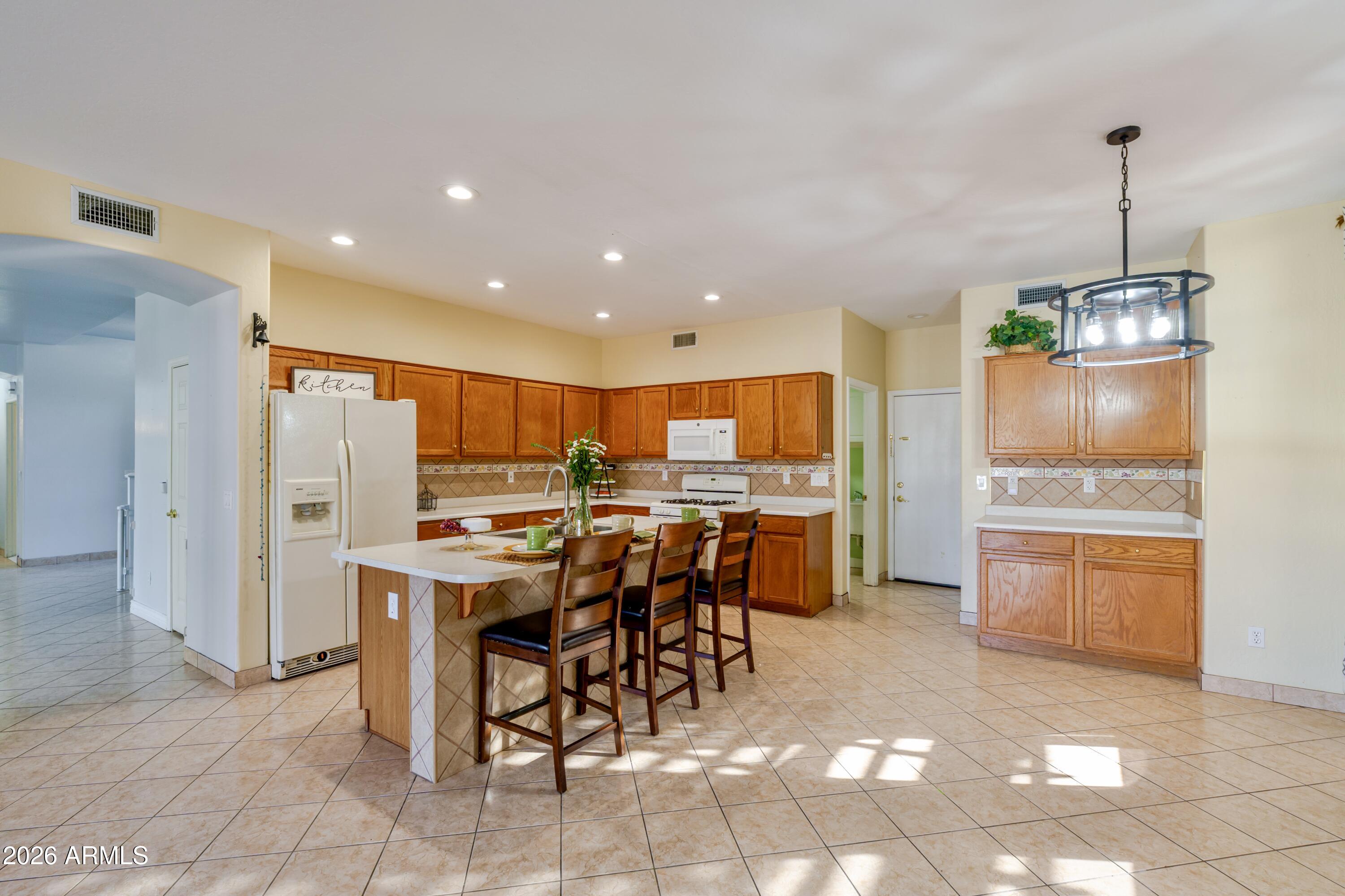 6788 W GREENBRIAR Drive