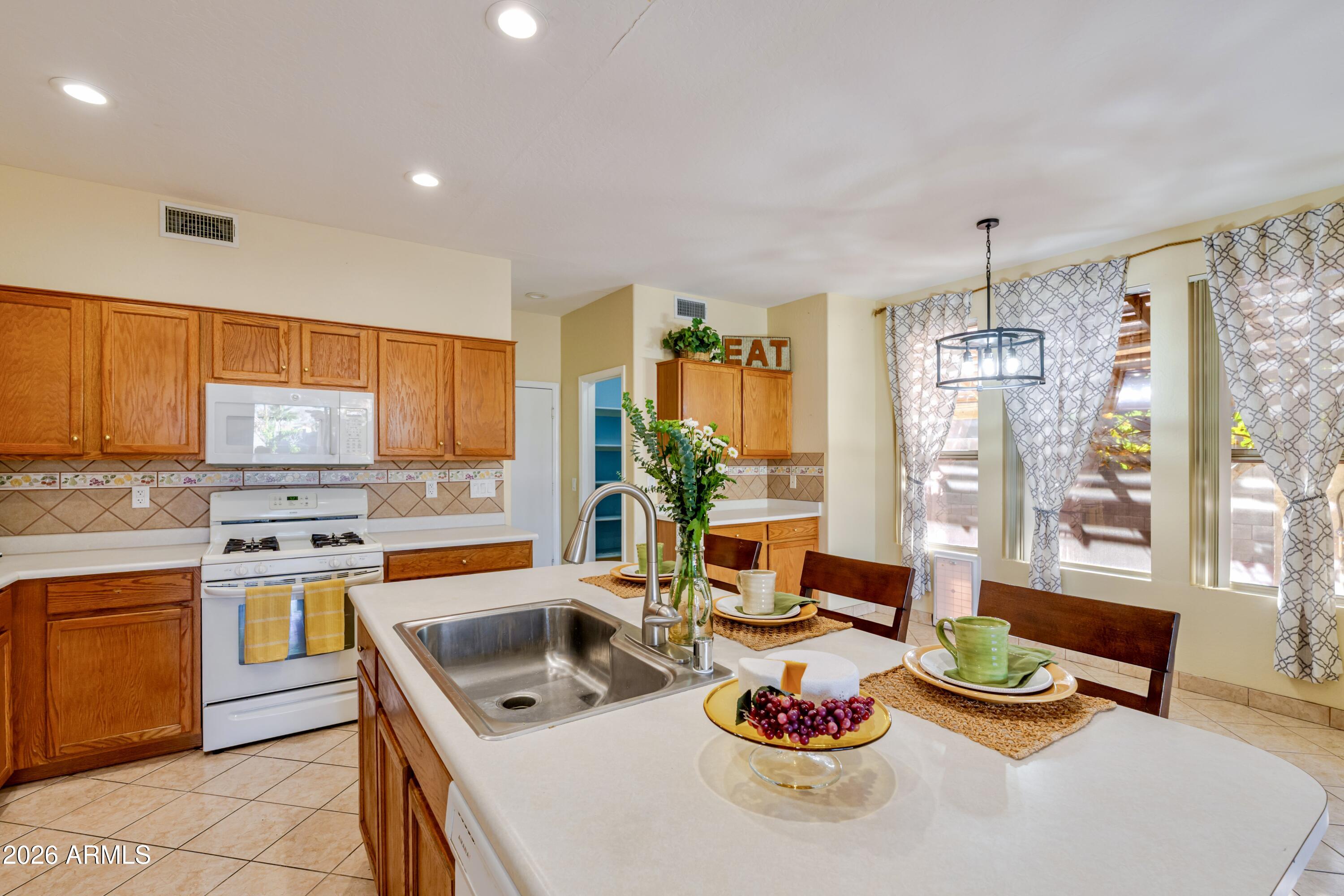 6788 W GREENBRIAR Drive