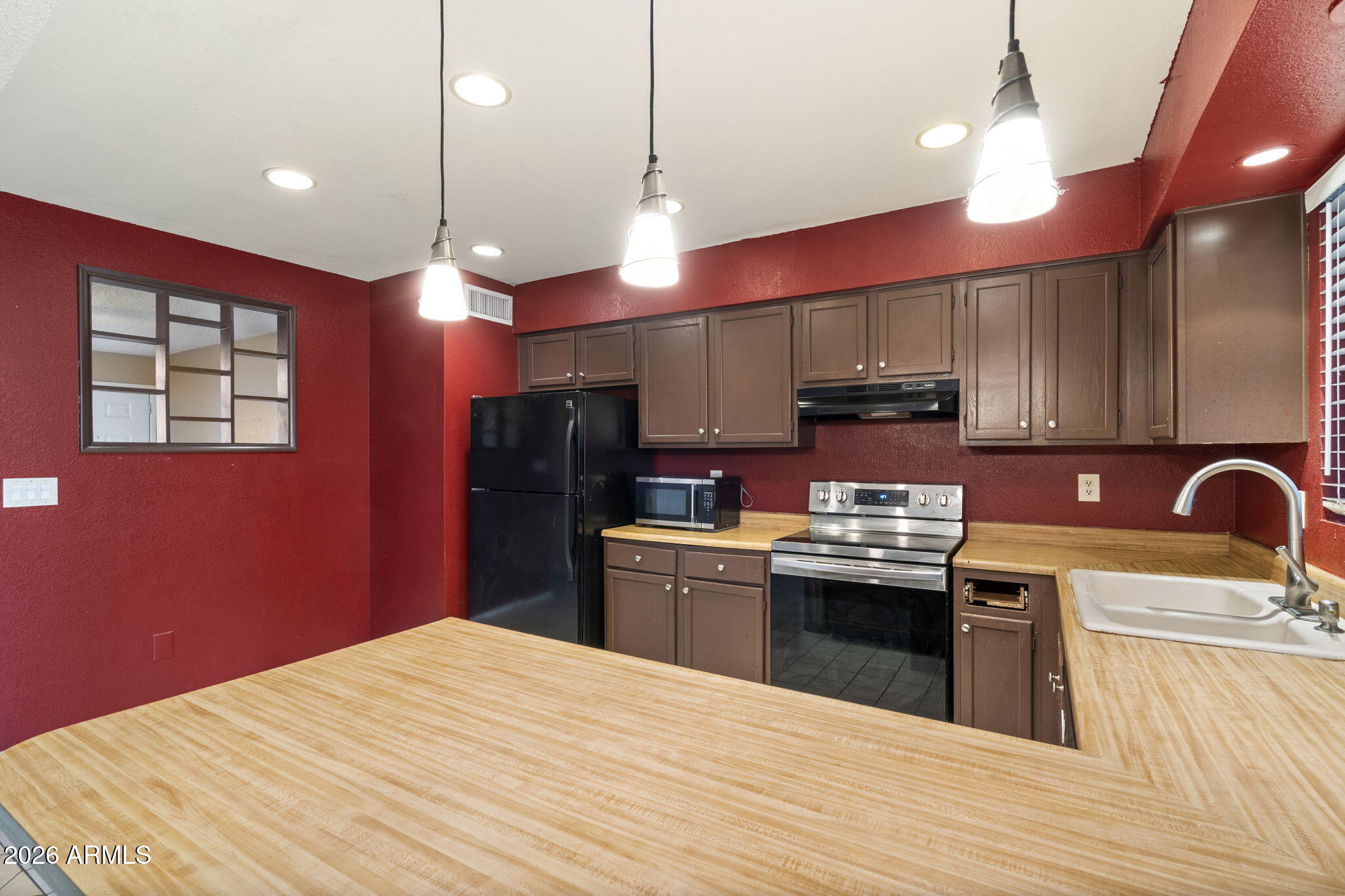 9063 W HARMONT Drive