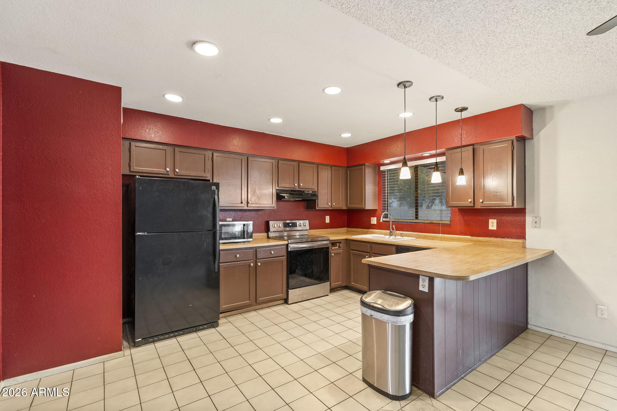 9063 W HARMONT Drive