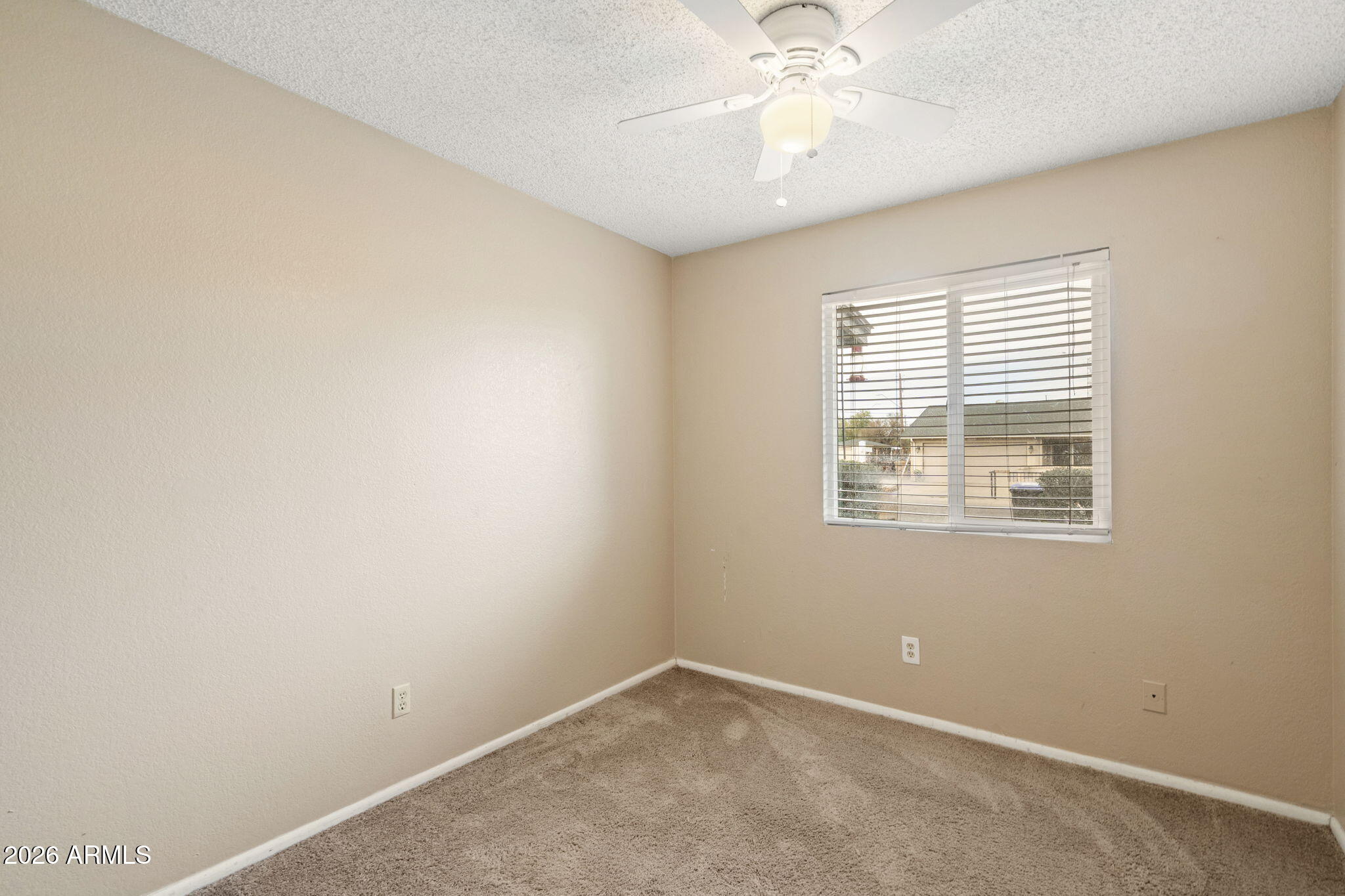 9063 W HARMONT Drive