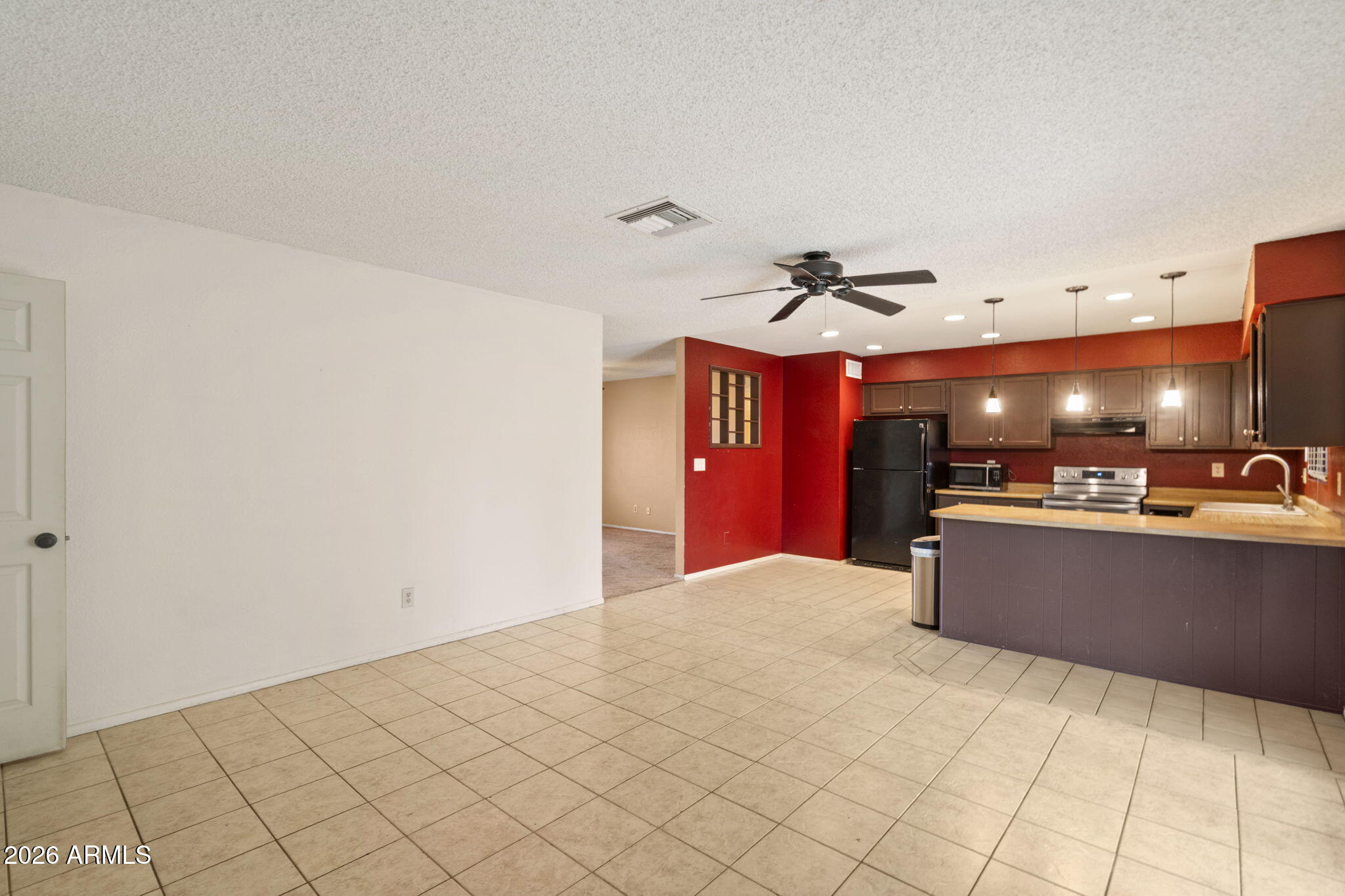 9063 W HARMONT Drive