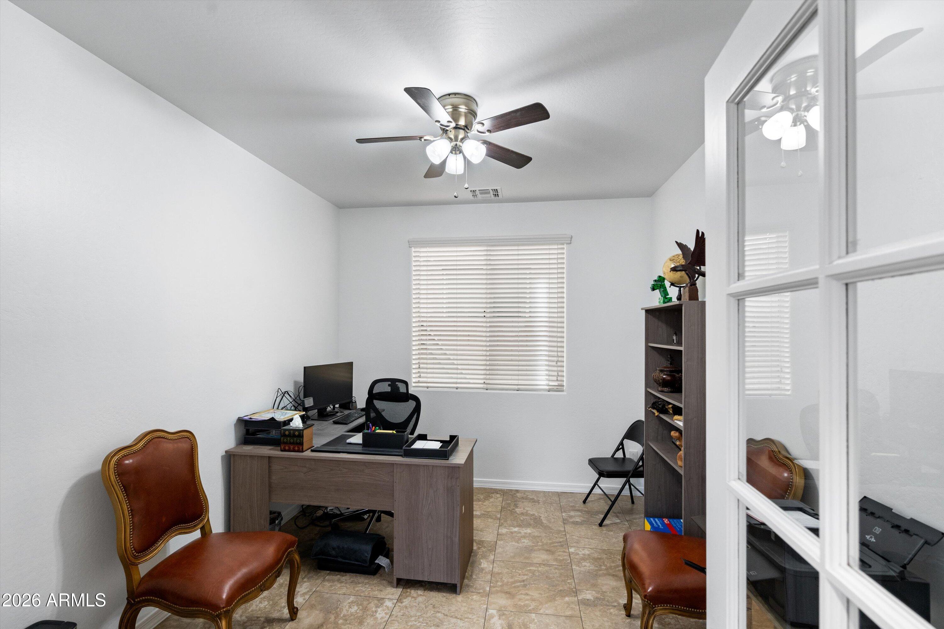 10933 E RENFIELD Avenue