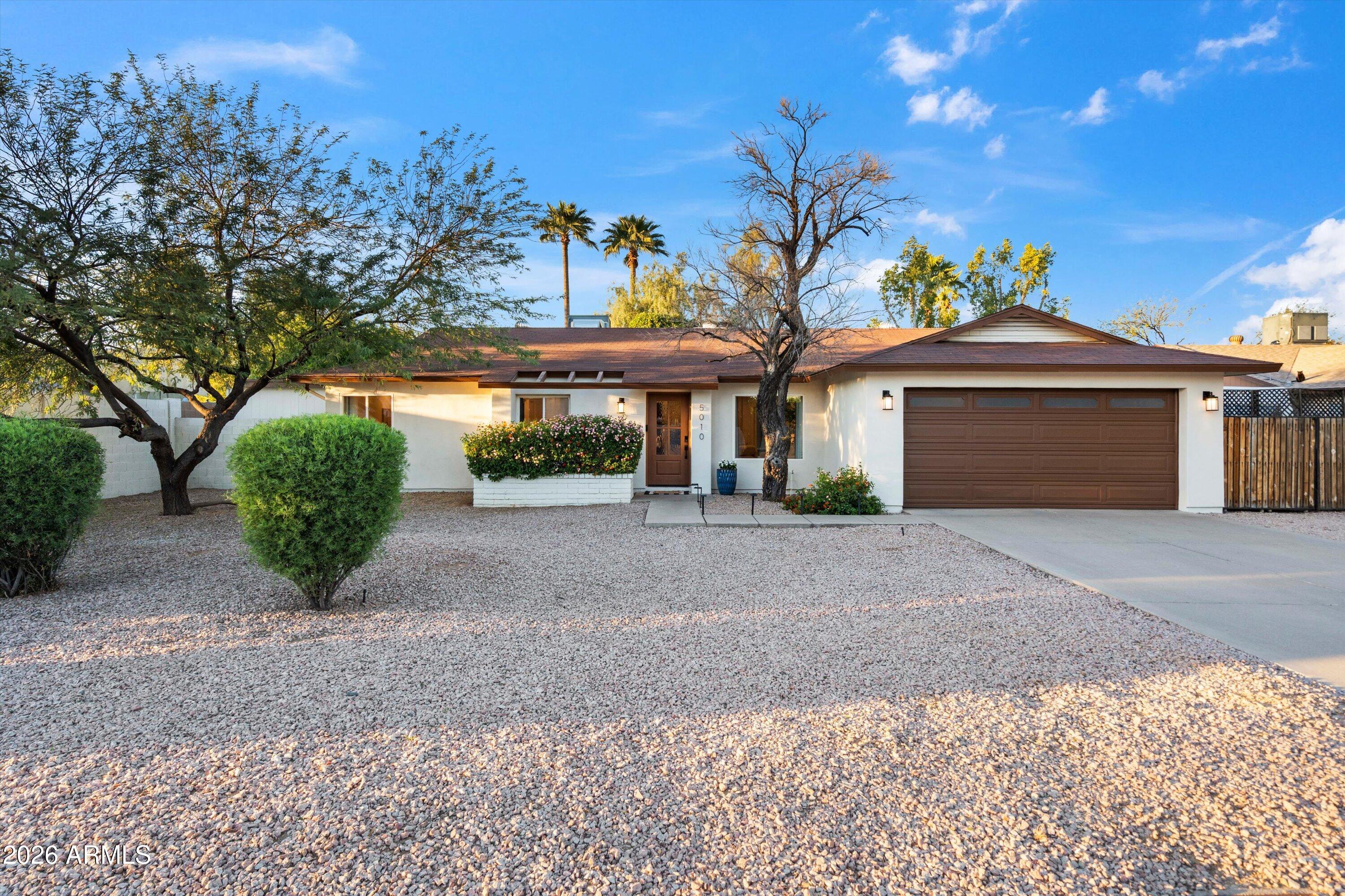 5010 E DAHLIA Drive