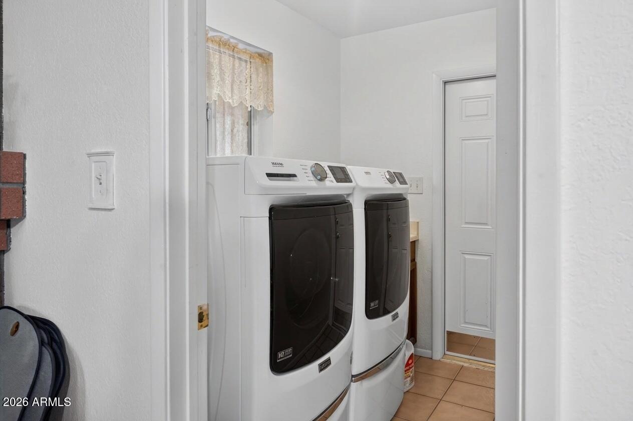 10437 W BUTLER Drive