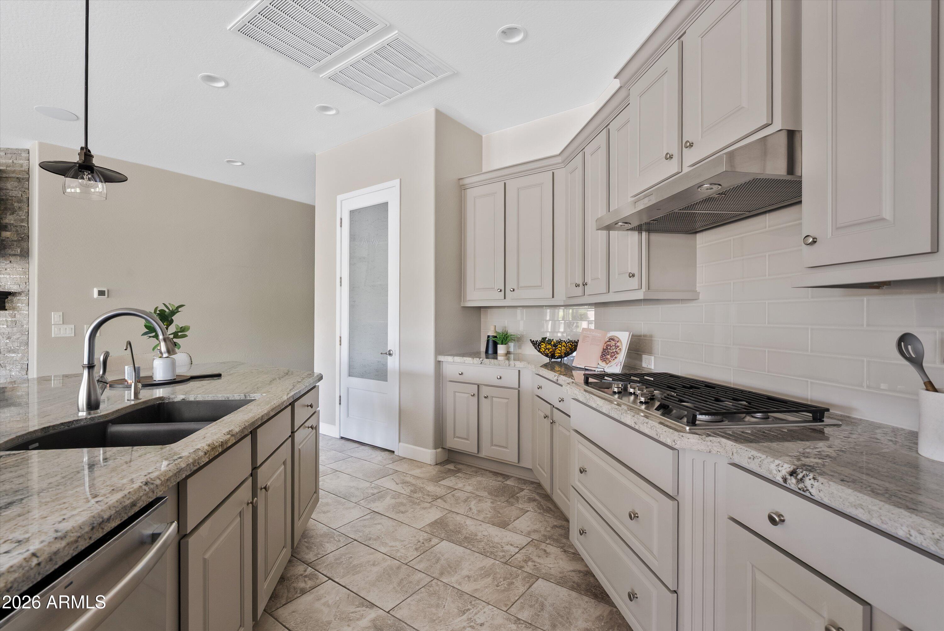10310 E GAMMA Avenue