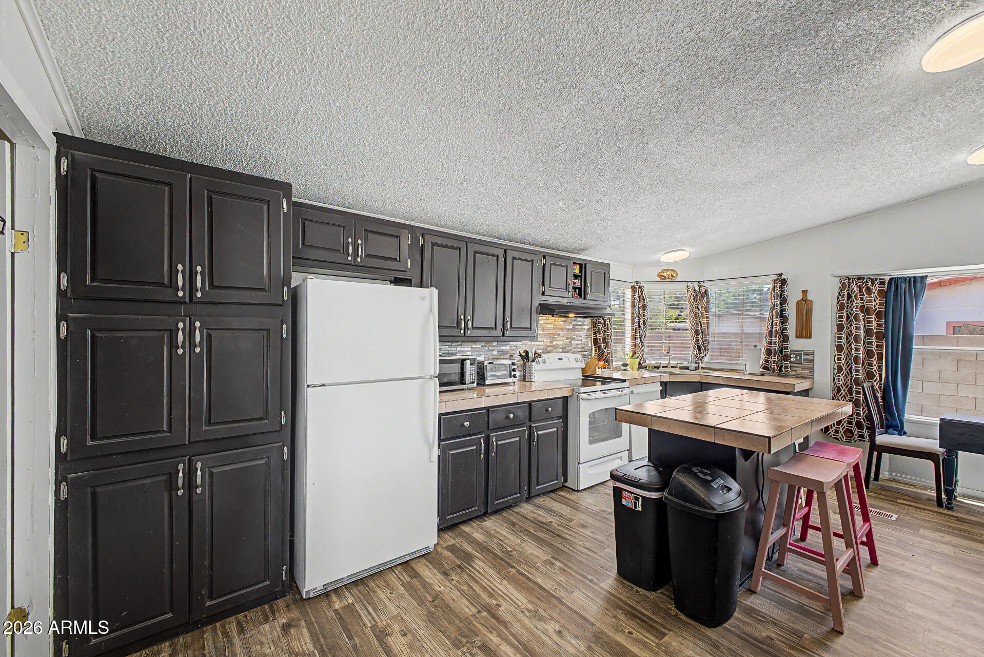 6907 W PATRICIA ANN Lane
