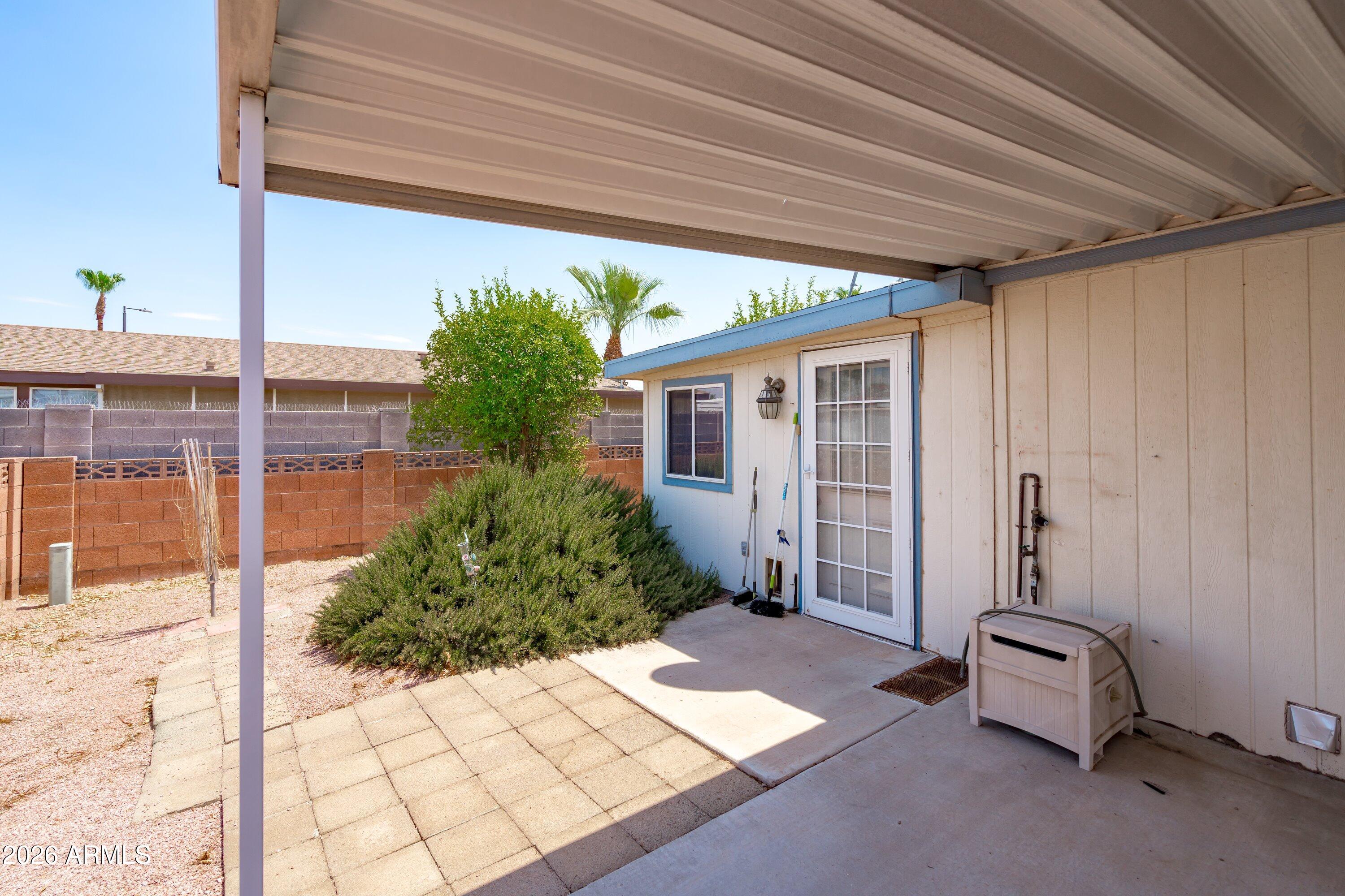 9009 E ELLASAR Avenue