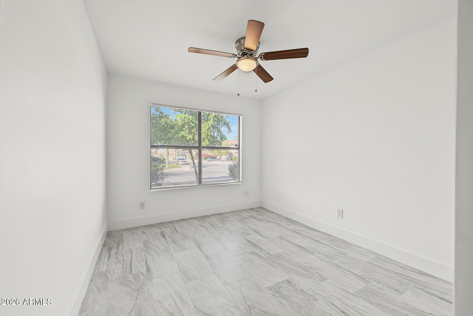 11557 W OLIVE Drive
