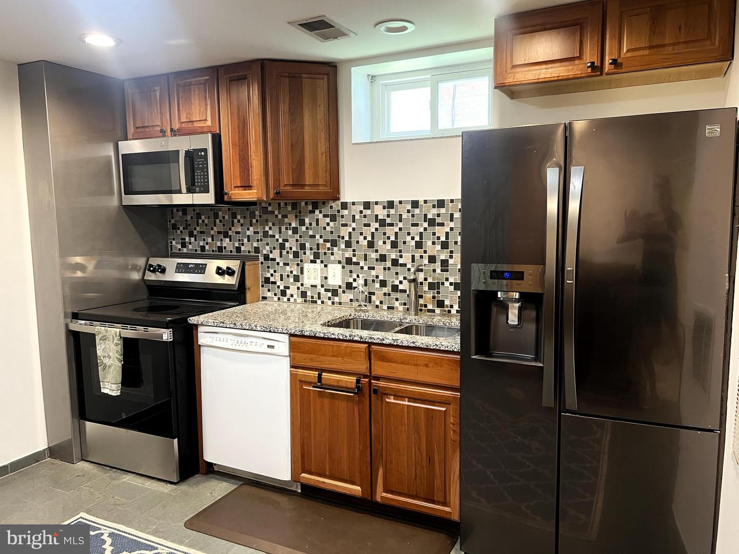 2302 E RANDOLPH AVE #BASEMENT