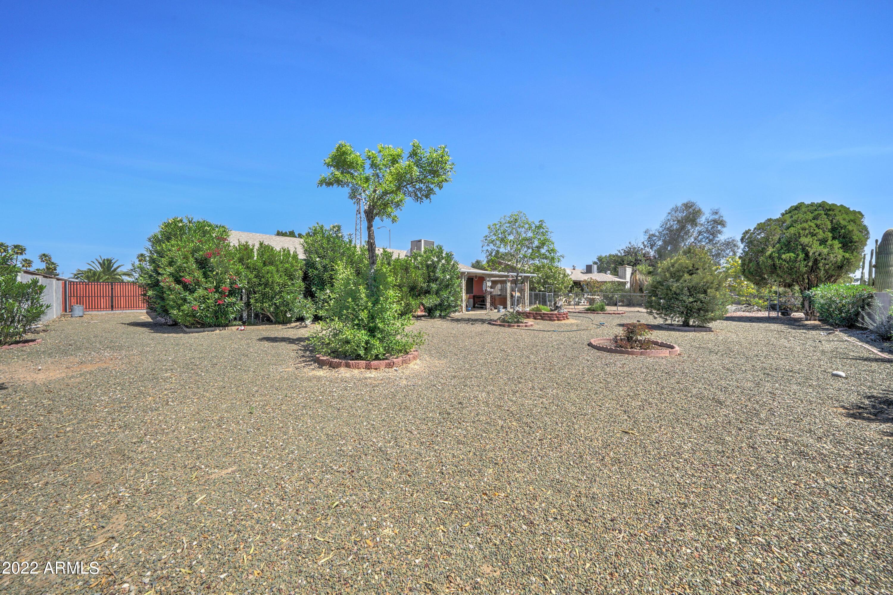 9875 W PALMERAS Drive