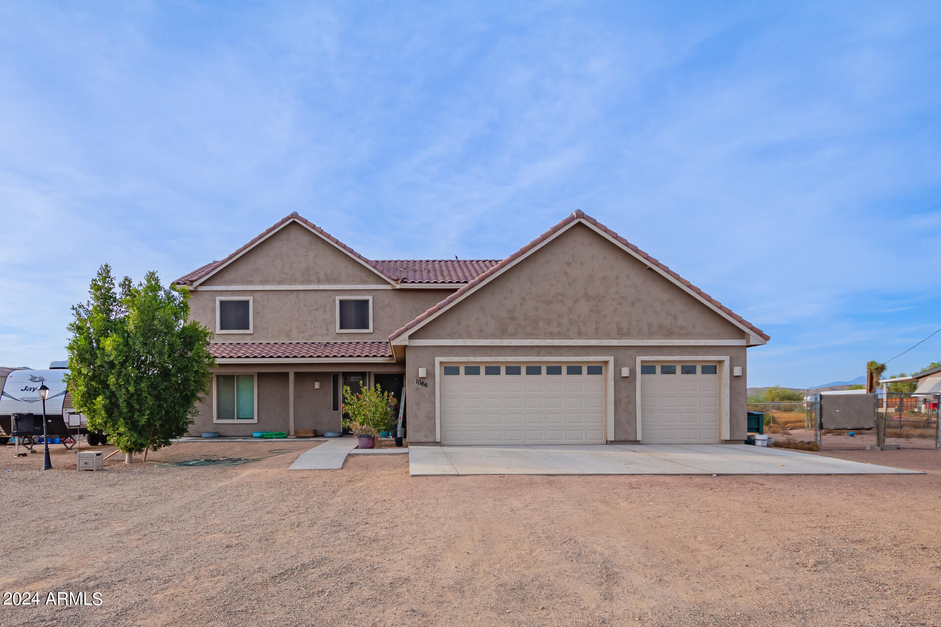 1066 W WINDSONG Street