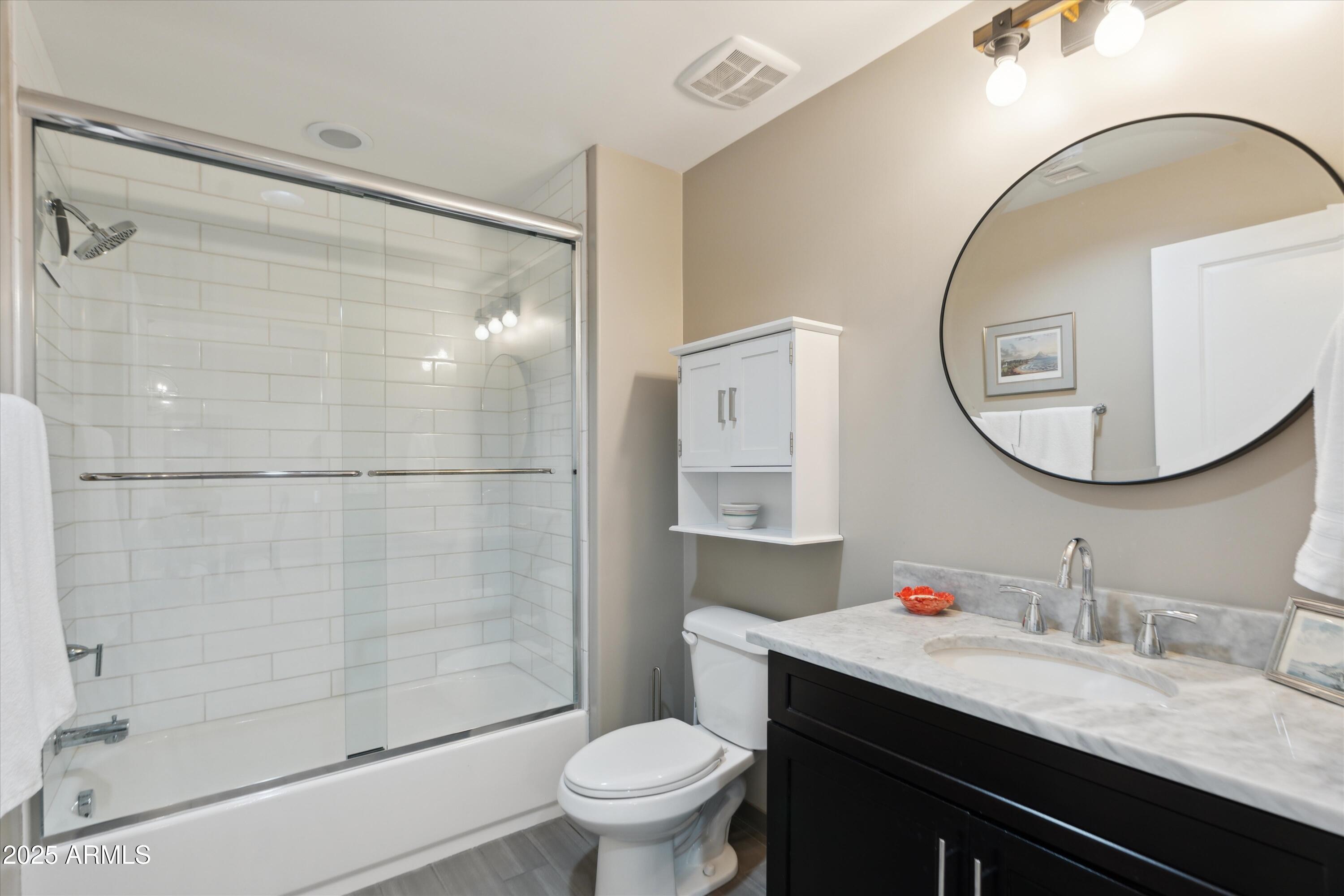 4805 N WOODMERE FAIRWAY, 2006