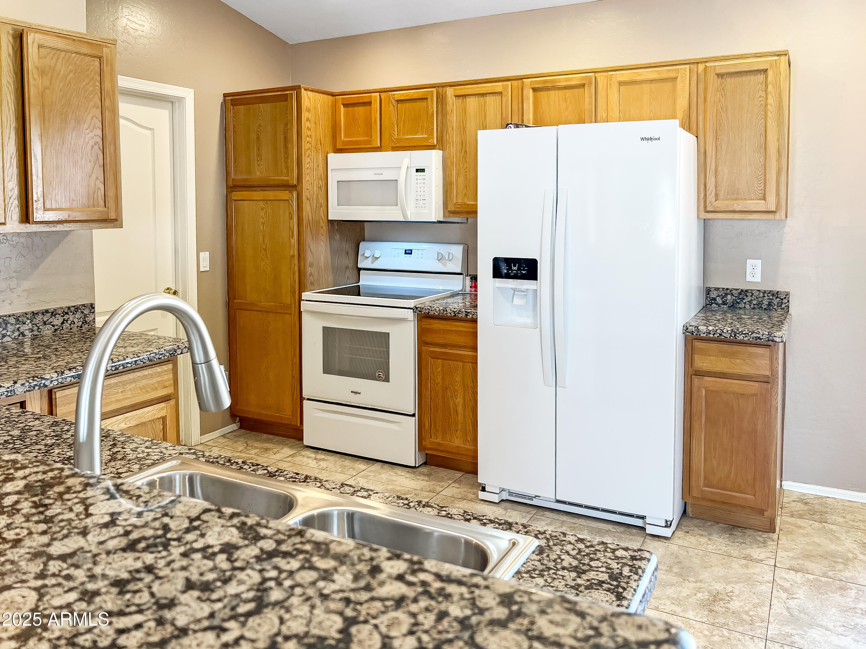 9792 W CAMELIA Drive