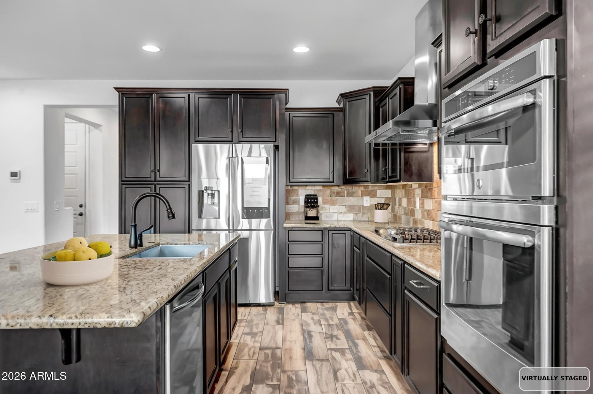 12687 W CARAVEO Place