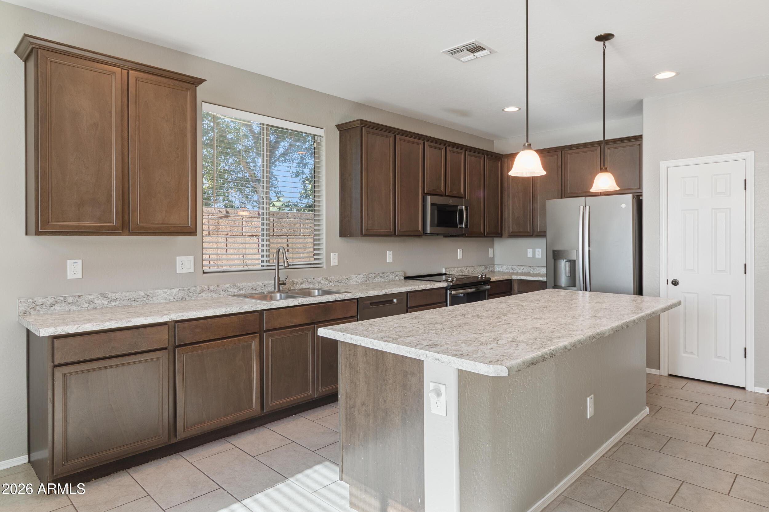 10257 W LAWRENCE Lane