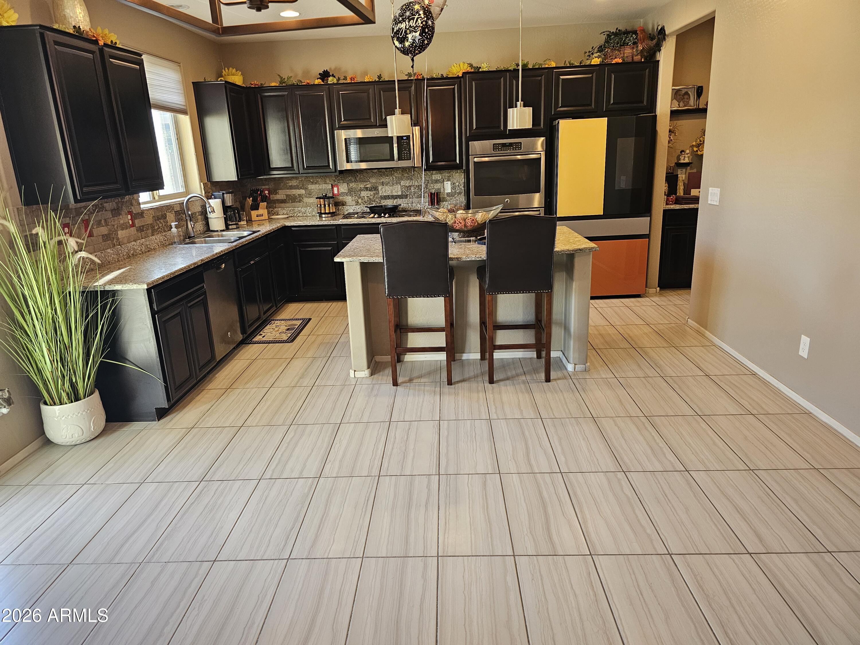 12209 W DAVIS Lane