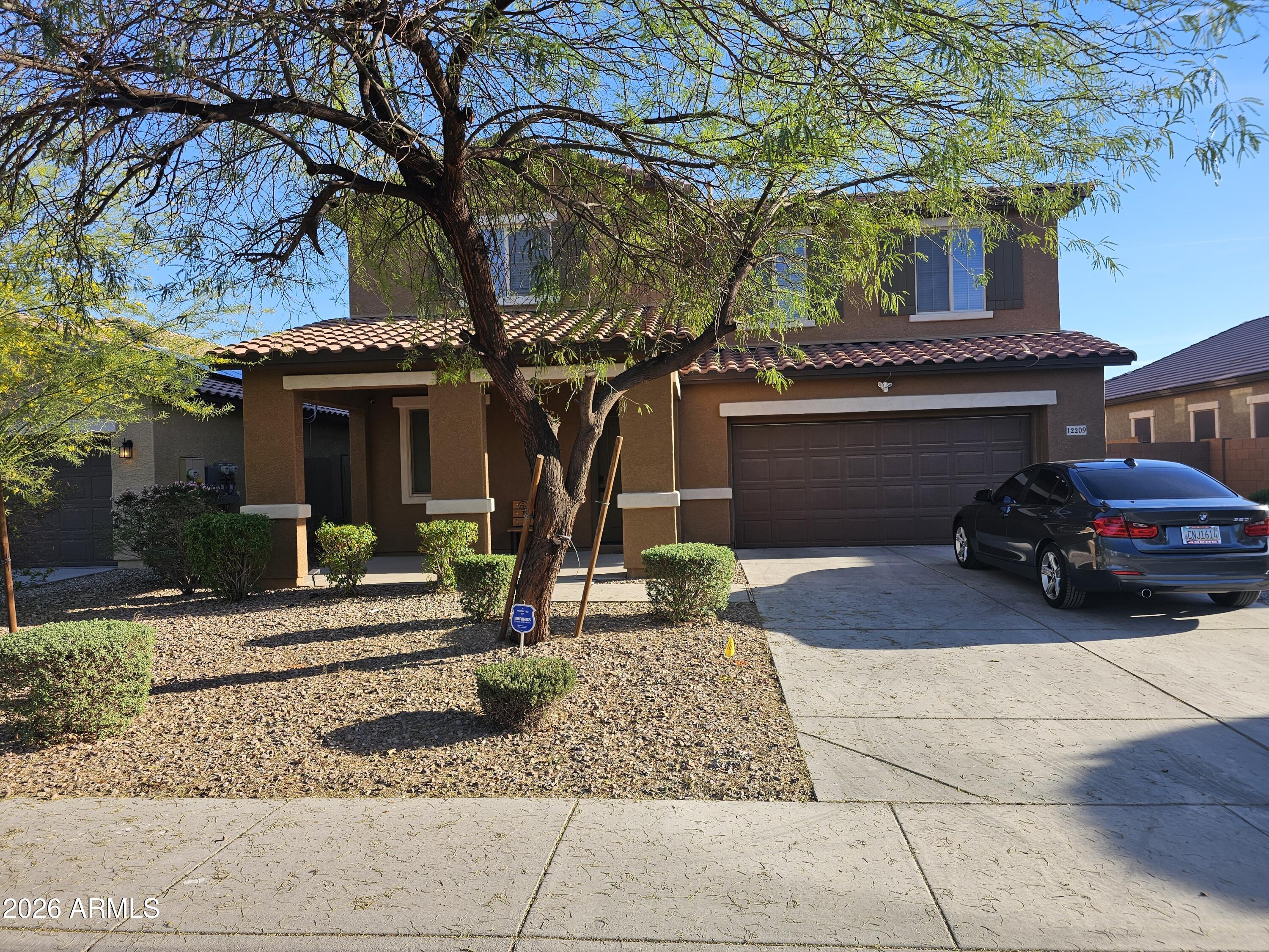 12209 W DAVIS Lane