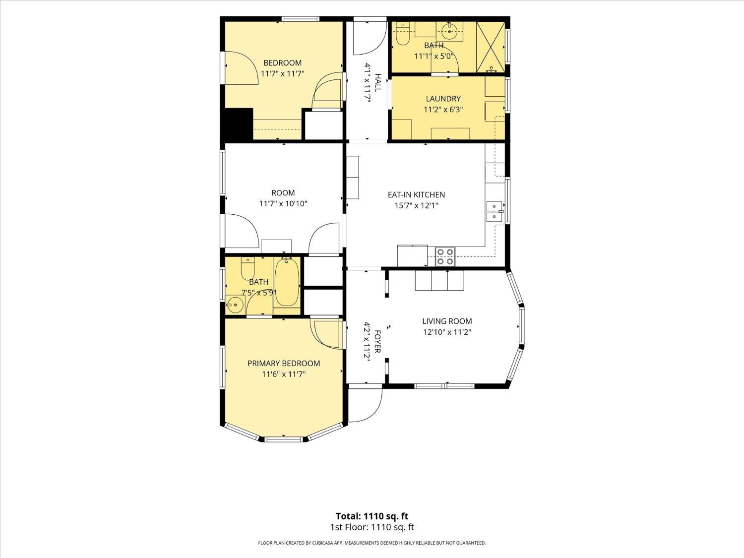Floor plan of a 1,110-square-foot home showing two bedrooms, two bathrooms, kitchen, living room, and laundry.