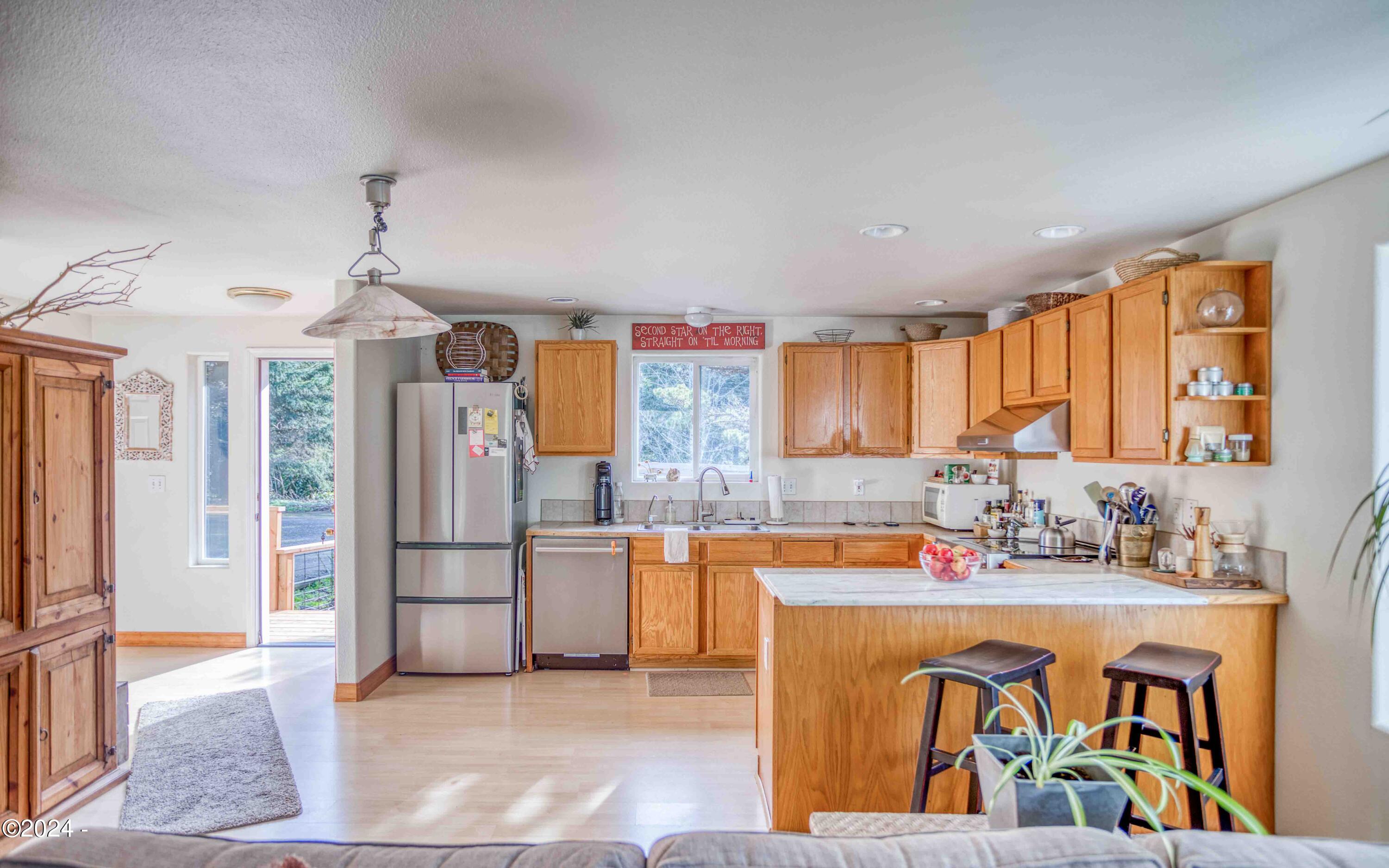 127 NE Shore Pine Court