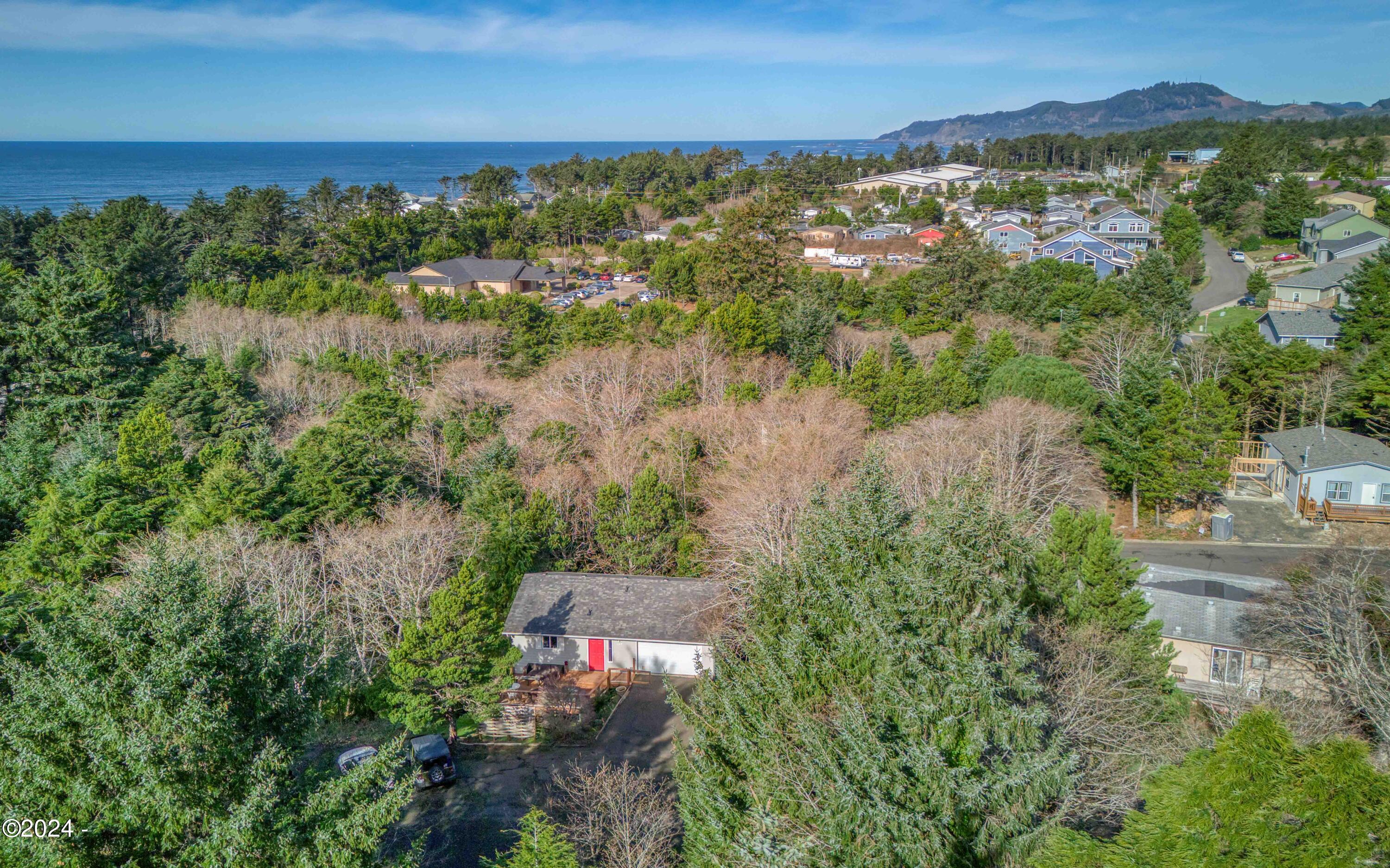 127 NE Shore Pine Court