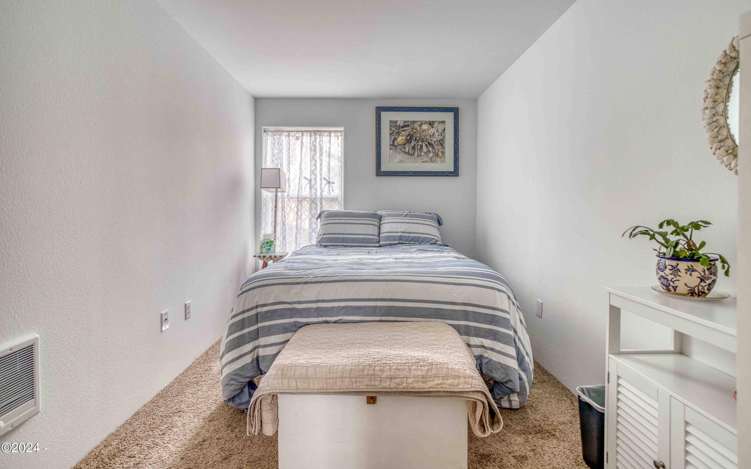 127 NE Shore Pine Court