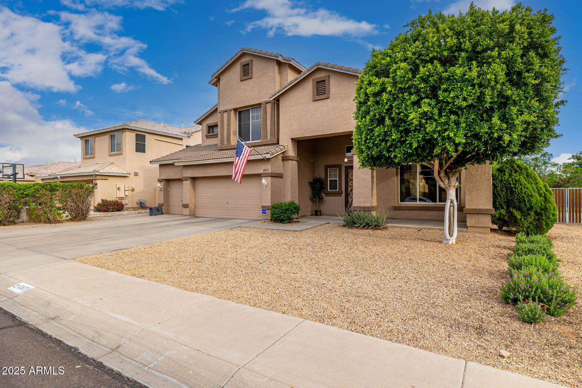 6971 W EL CORTEZ Place