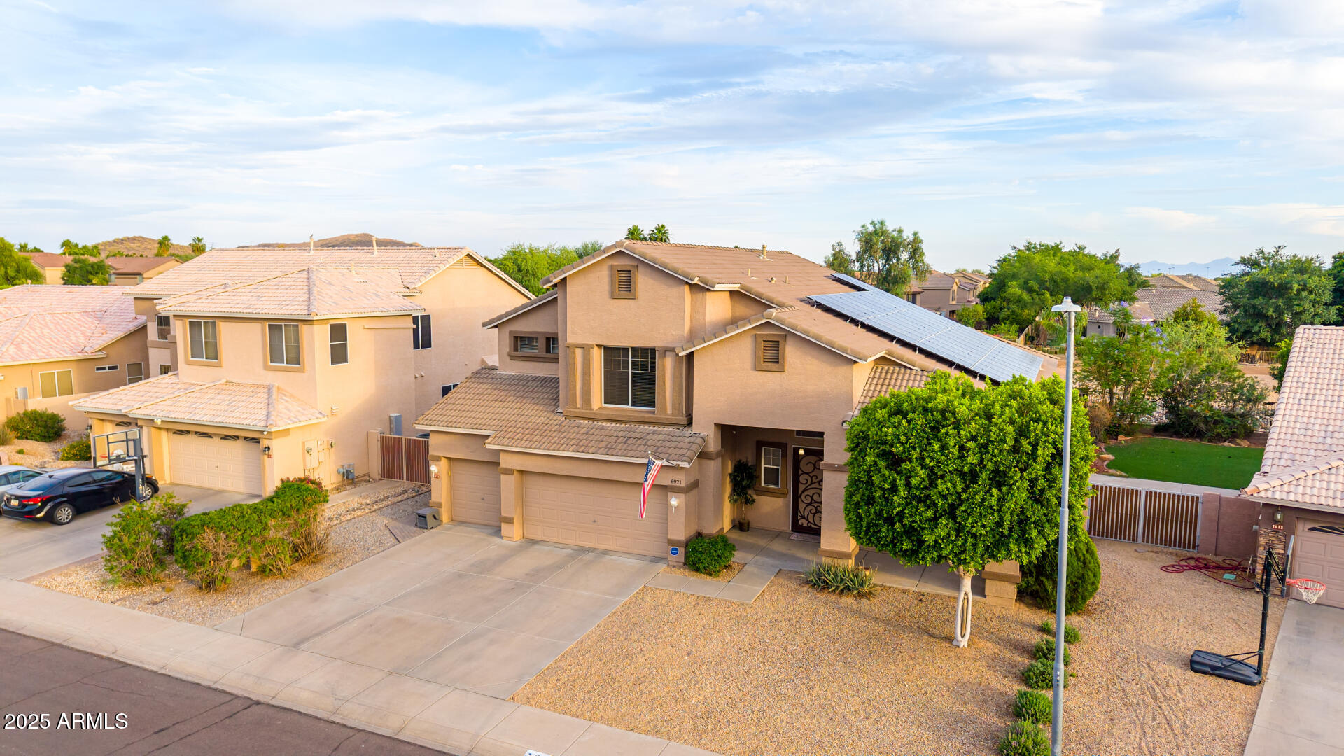 6971 W EL CORTEZ Place