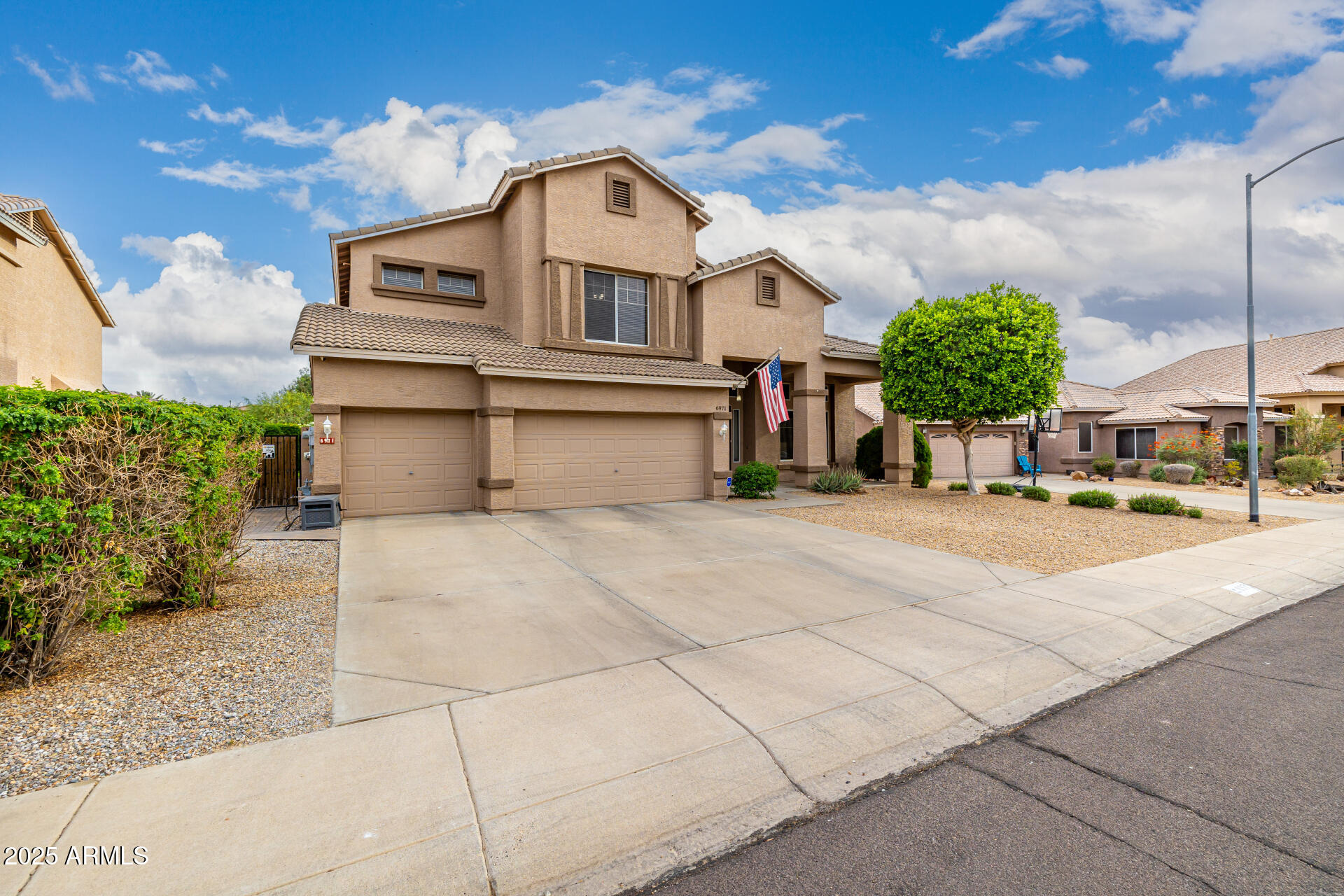 6971 W EL CORTEZ Place