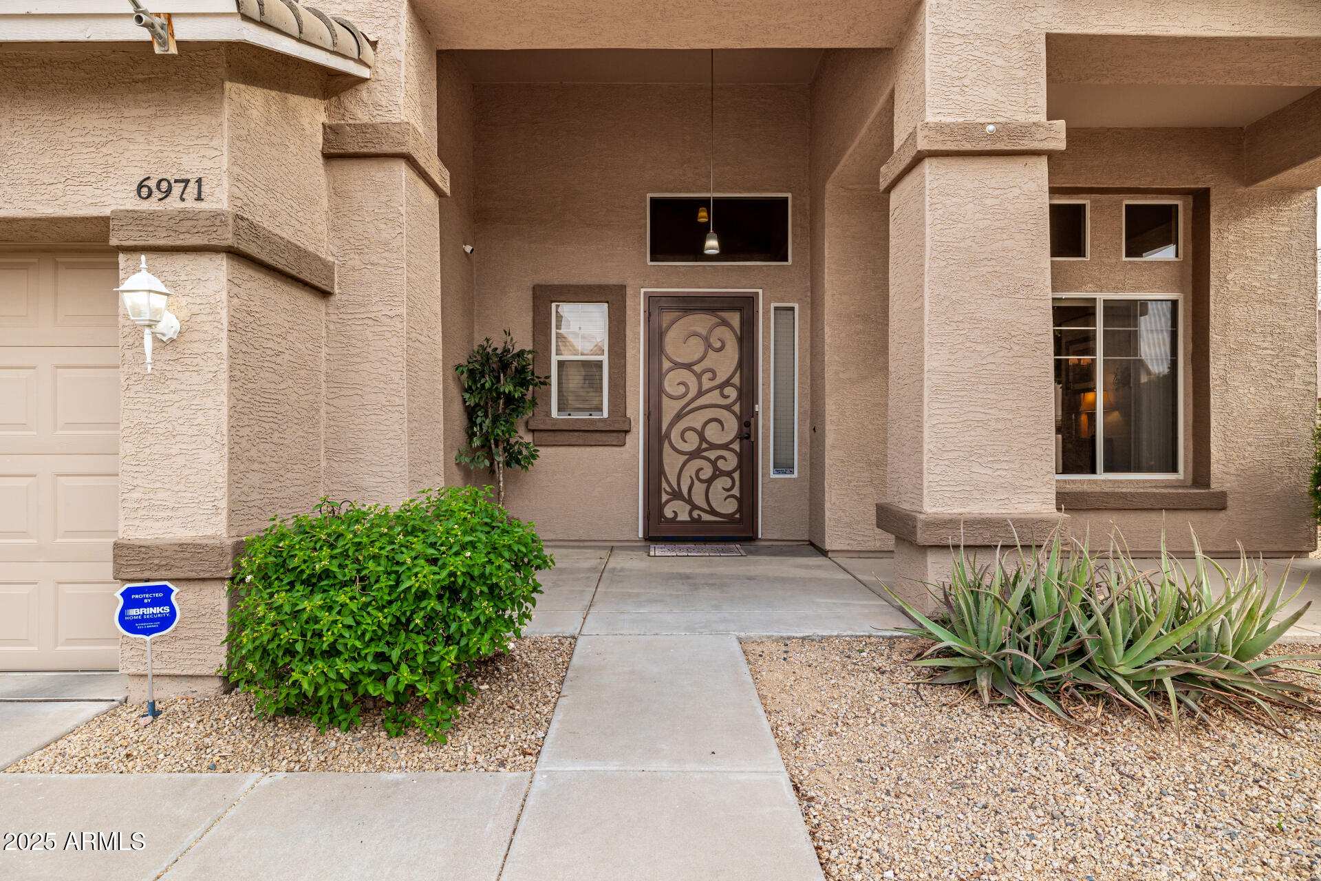 6971 W EL CORTEZ Place