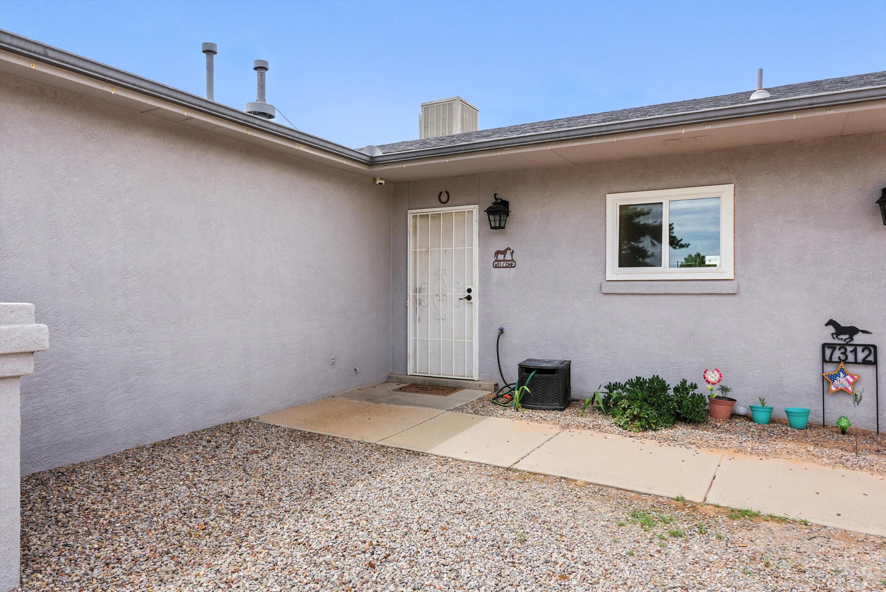 7312 PECHORA Drive NE