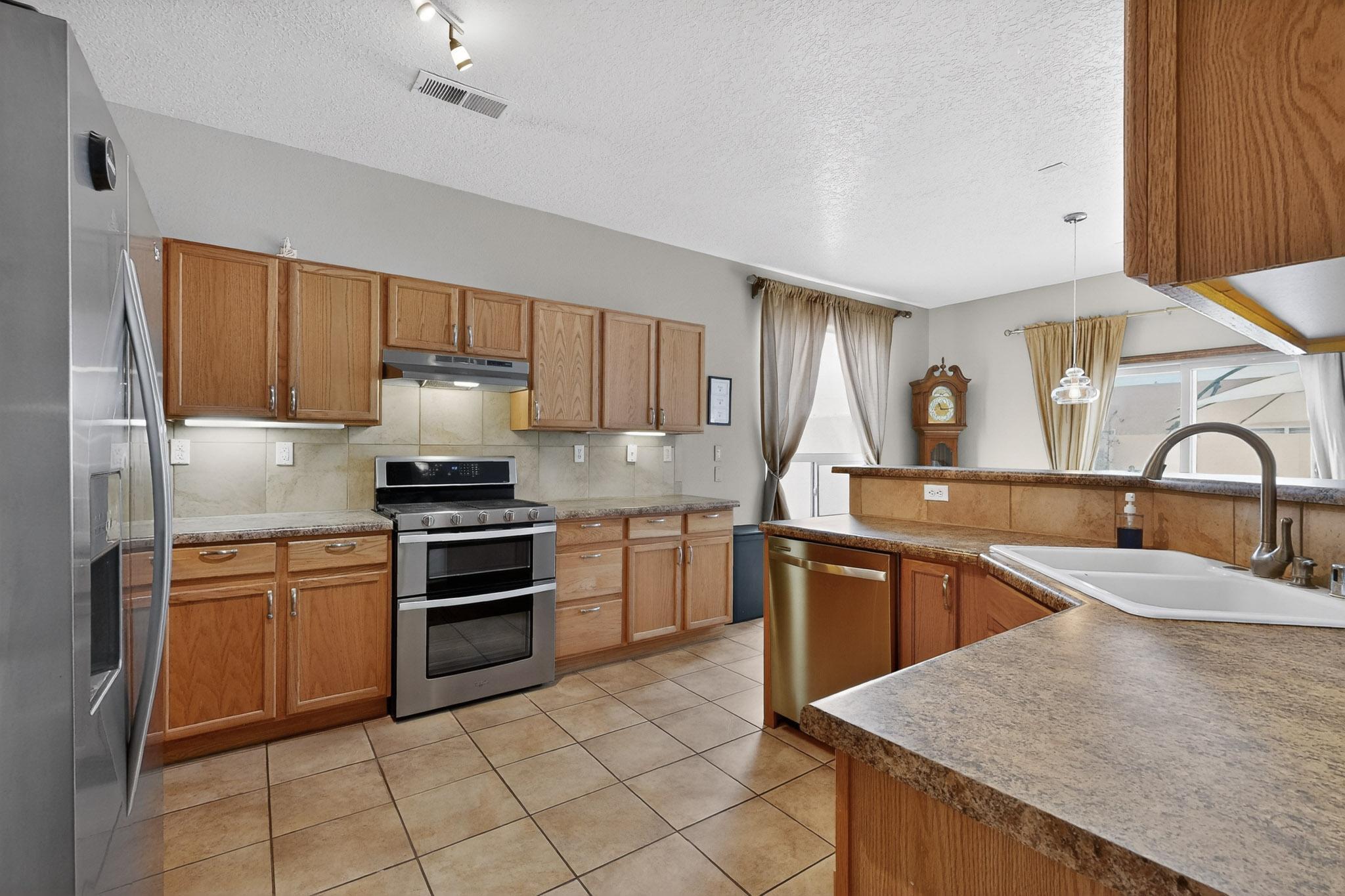 7712 Calle Carisma NE