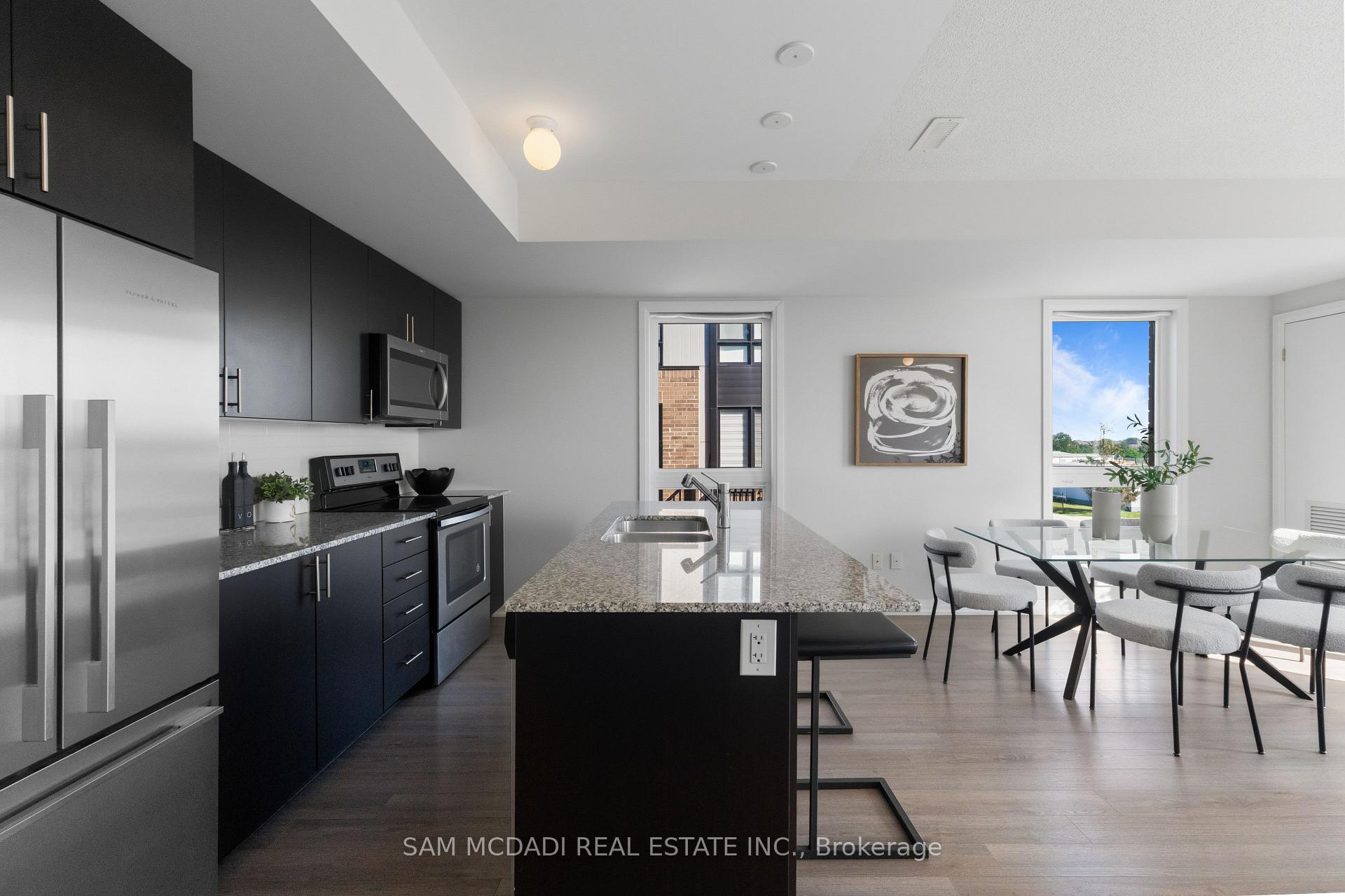 1208 Main Street E 201