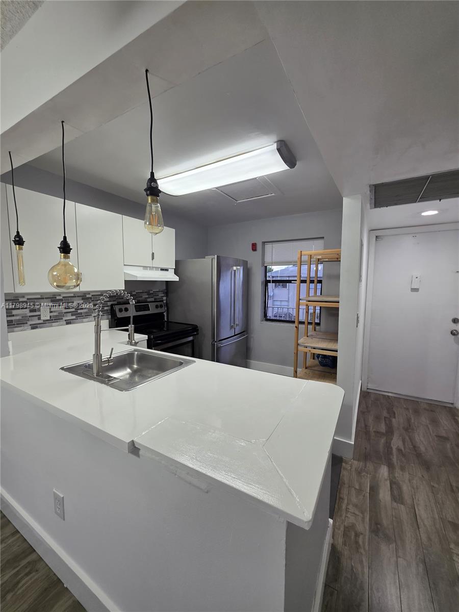 7670 SW 152nd Ave # 205 Unit: 1-205