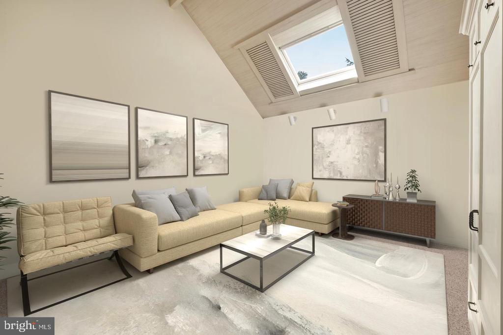 Staged living room with a skylight, vaulted wood ceiling, cream sectional, and marble-top coffee table.