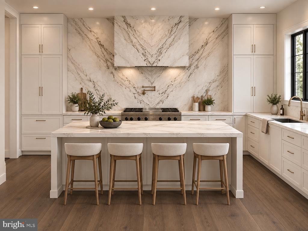 Staged kitchen with a veined marble island, four bar stools, and matching marble backsplash.