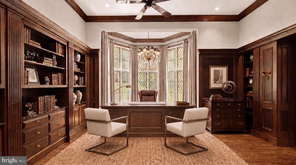 Wood-paneled home office with built-in bookshelves, a central desk, and bay windows.