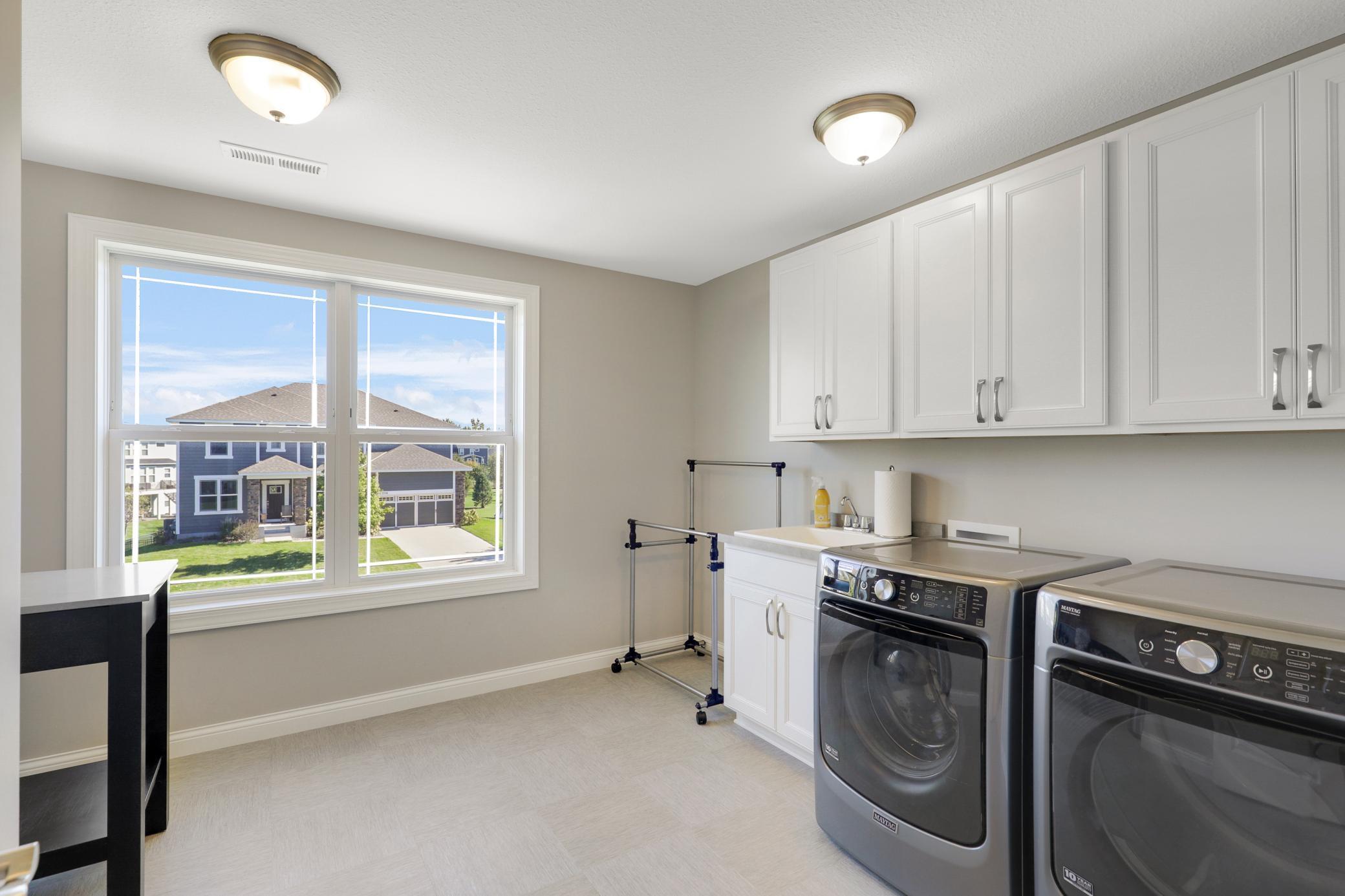 Turnkey, Walkout, 2-Story in Coveted Oxbow Cove