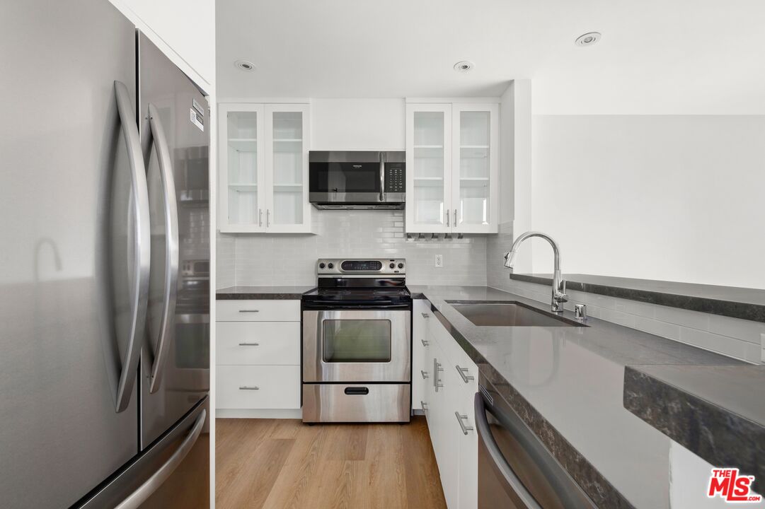 1100 Alta Loma Road Unit: C