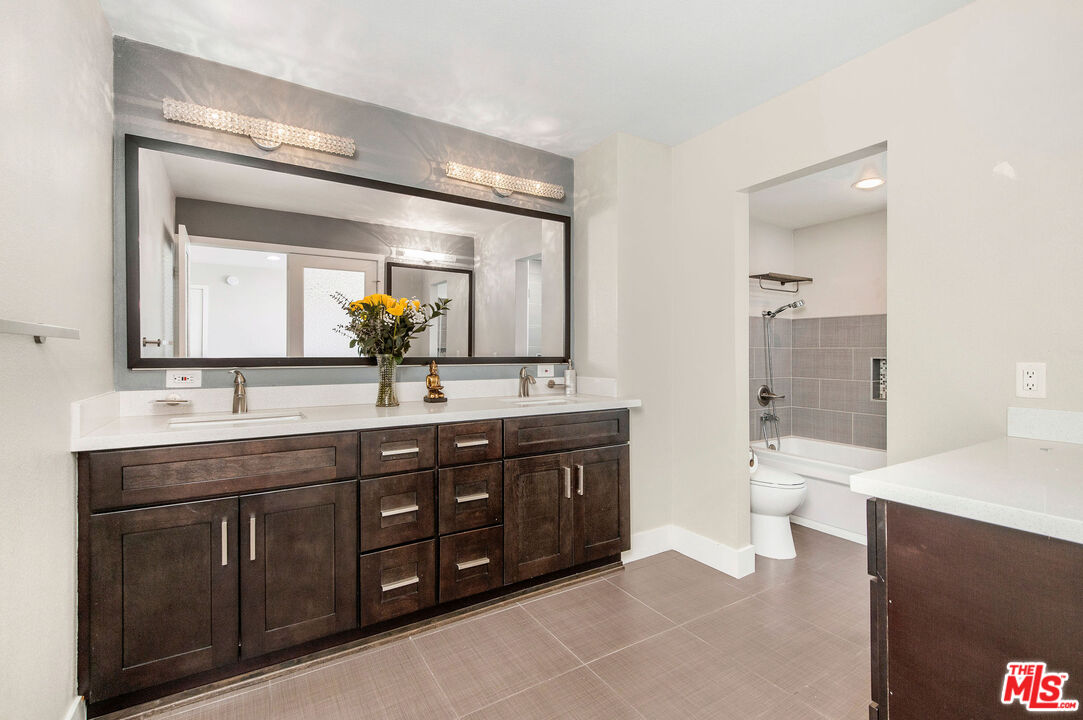 150 N Almont Dr Unit: 203